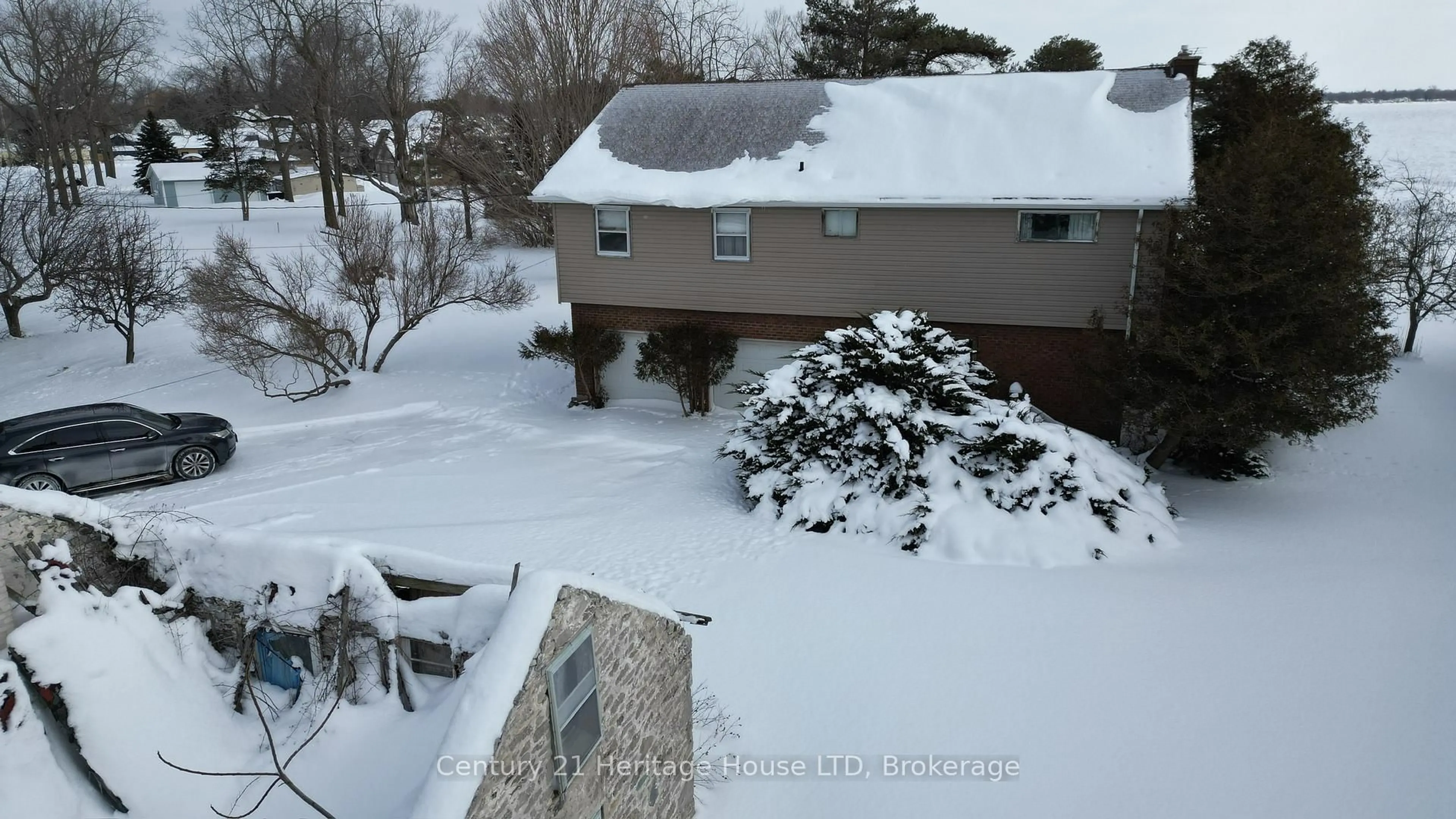 A pic from outside/outdoor area/front of a property/back of a property/a pic from drone, street for 12033 Augustine Rd, Wainfleet Ontario L0S 1V0