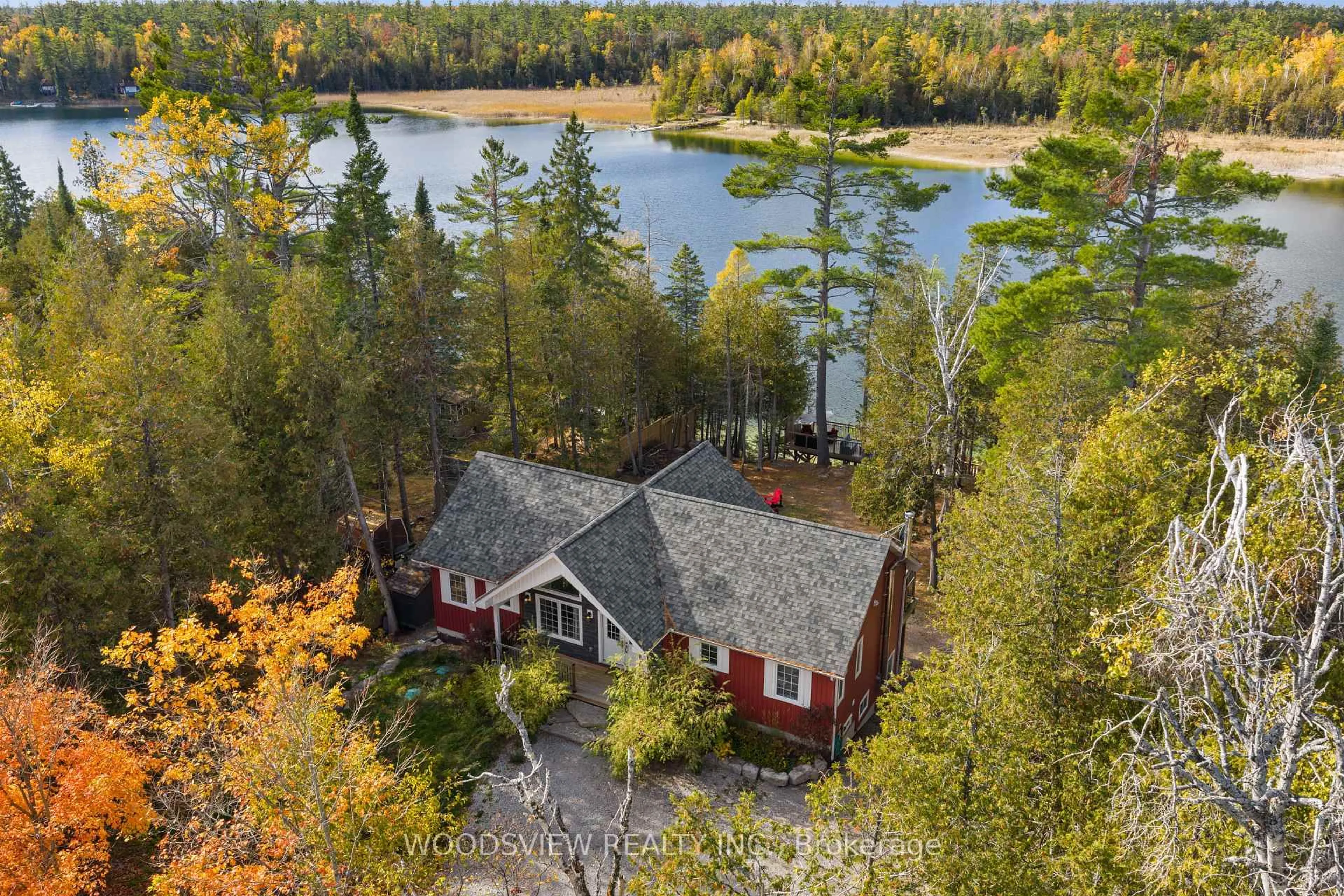 A pic from outside/outdoor area/front of a property/back of a property/a pic from drone, water/lake/river/ocean view for 89 Little Silver Way, Trent Lakes Ontario K0M 1A0