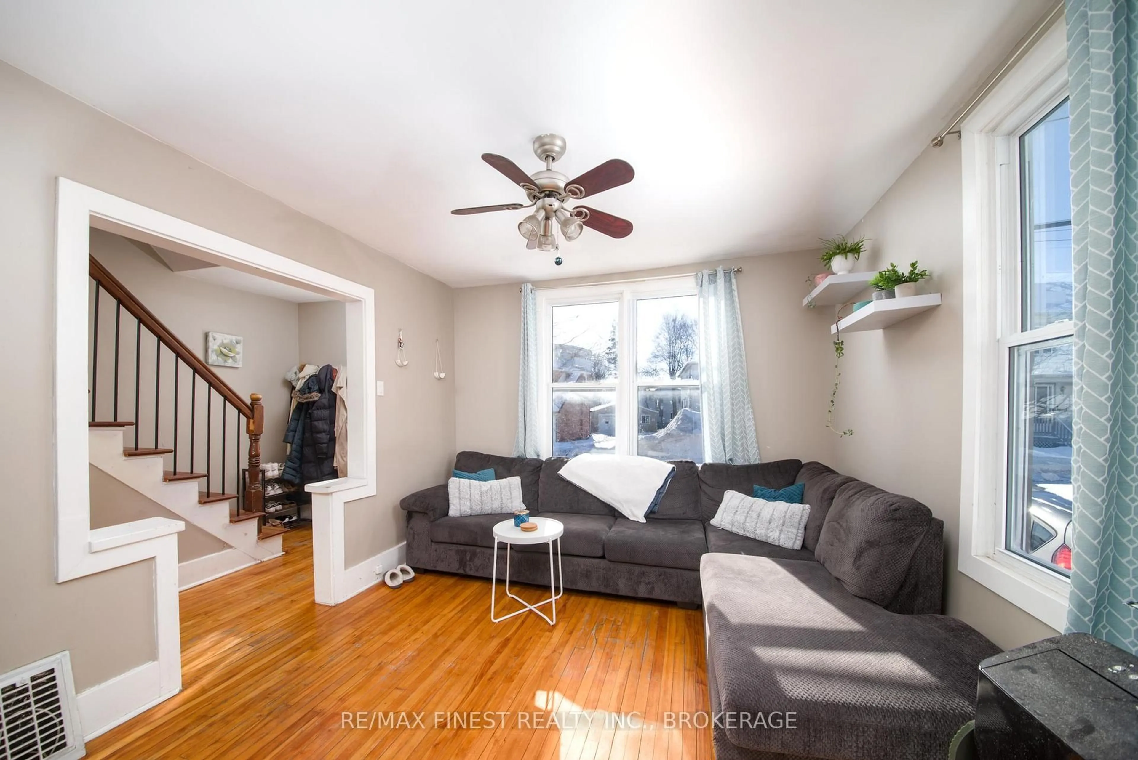 Living room with furniture, wood/laminate floor for 43 Durham St, Kingston Ontario K7L 1J2