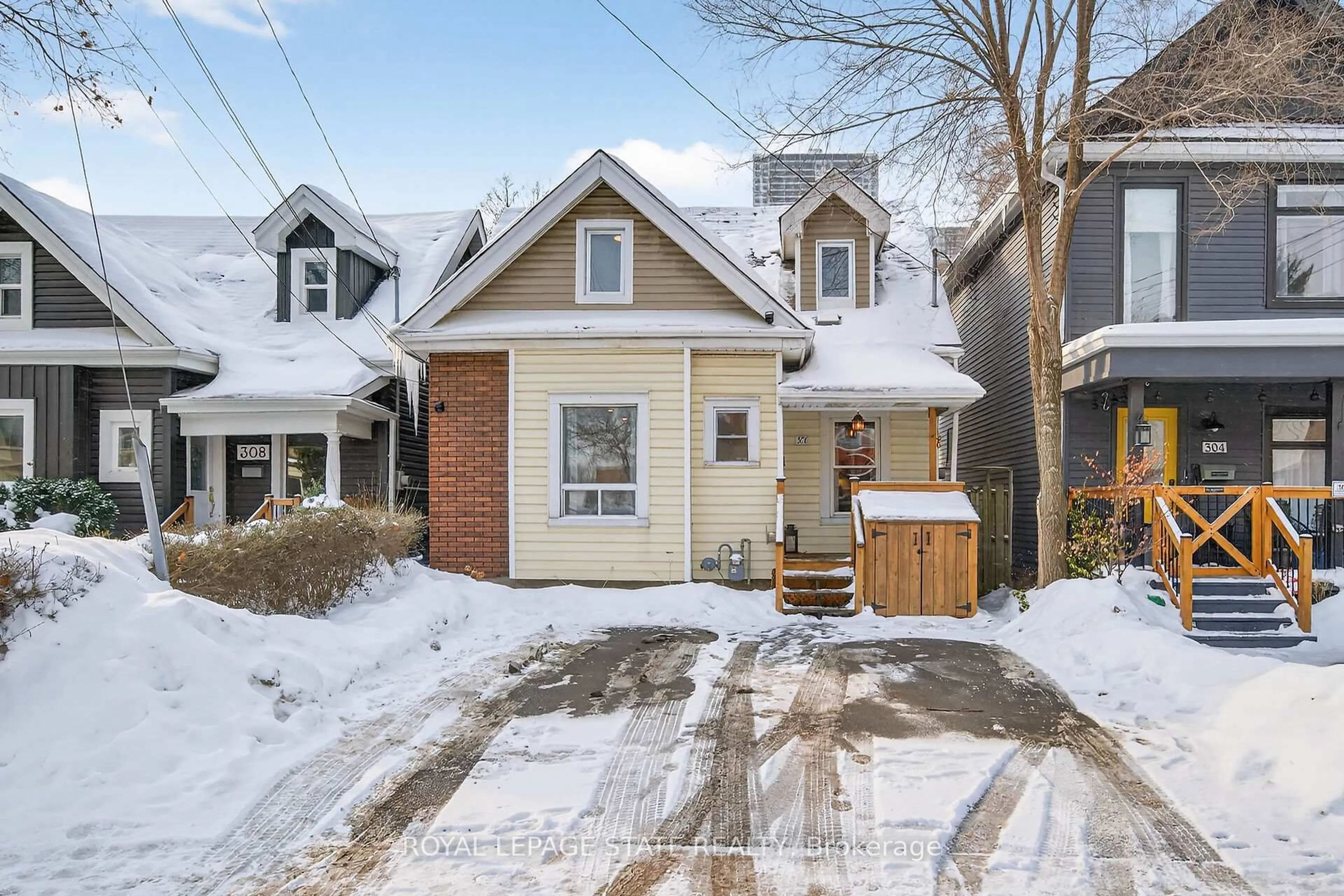 Home with brick exterior material, street for 306 Cumberland Ave, Hamilton Ontario L8M 2A1