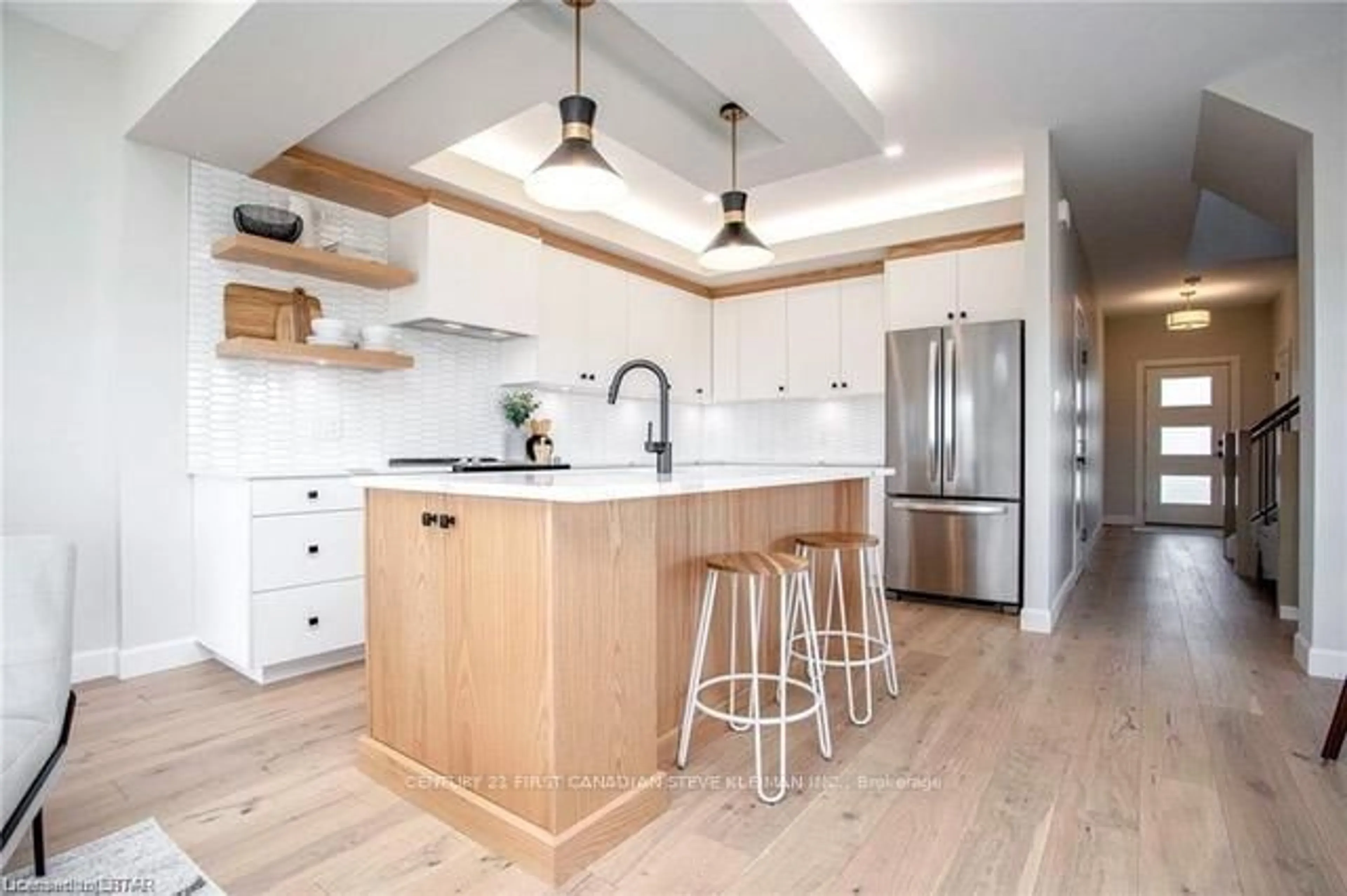 Open concept kitchen, wood/laminate floor for 2700 Buroak Dr #35, London North Ontario N6G 5B6