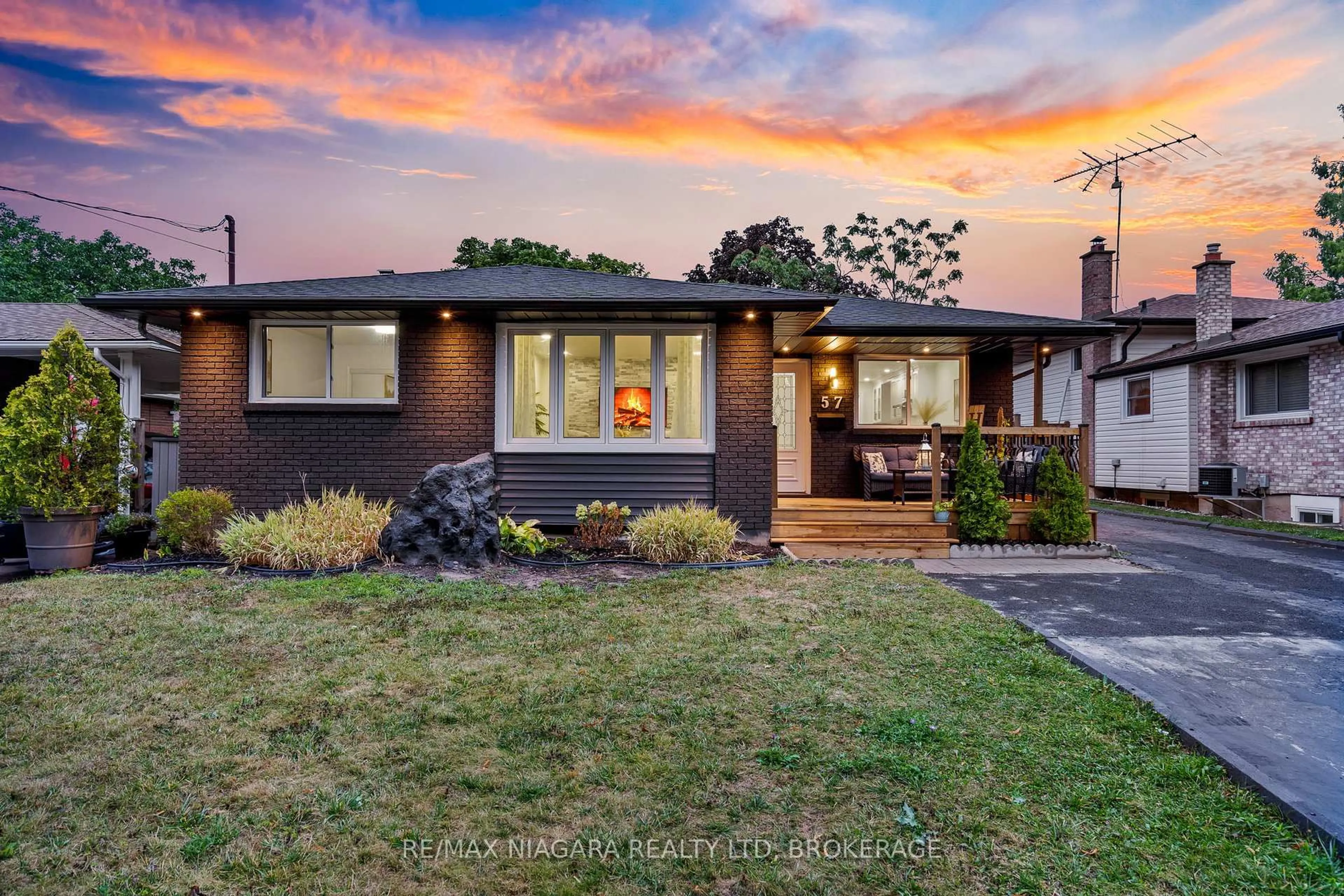 Home with brick exterior material, street for 57 Woodrow St, St. Catharines Ontario L2P 2A4