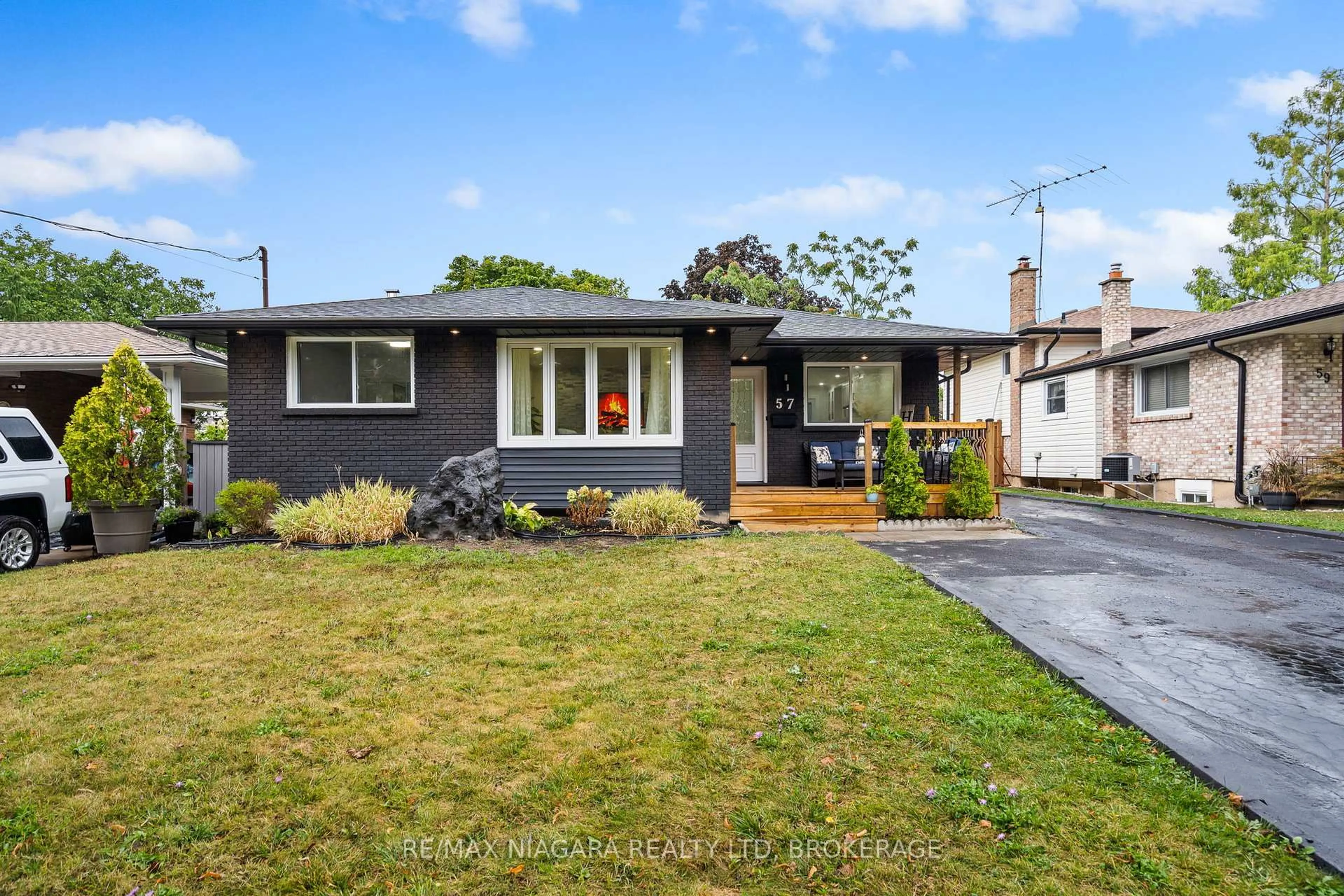 Home with vinyl exterior material, street for 57 Woodrow St, St. Catharines Ontario L2P 2A4