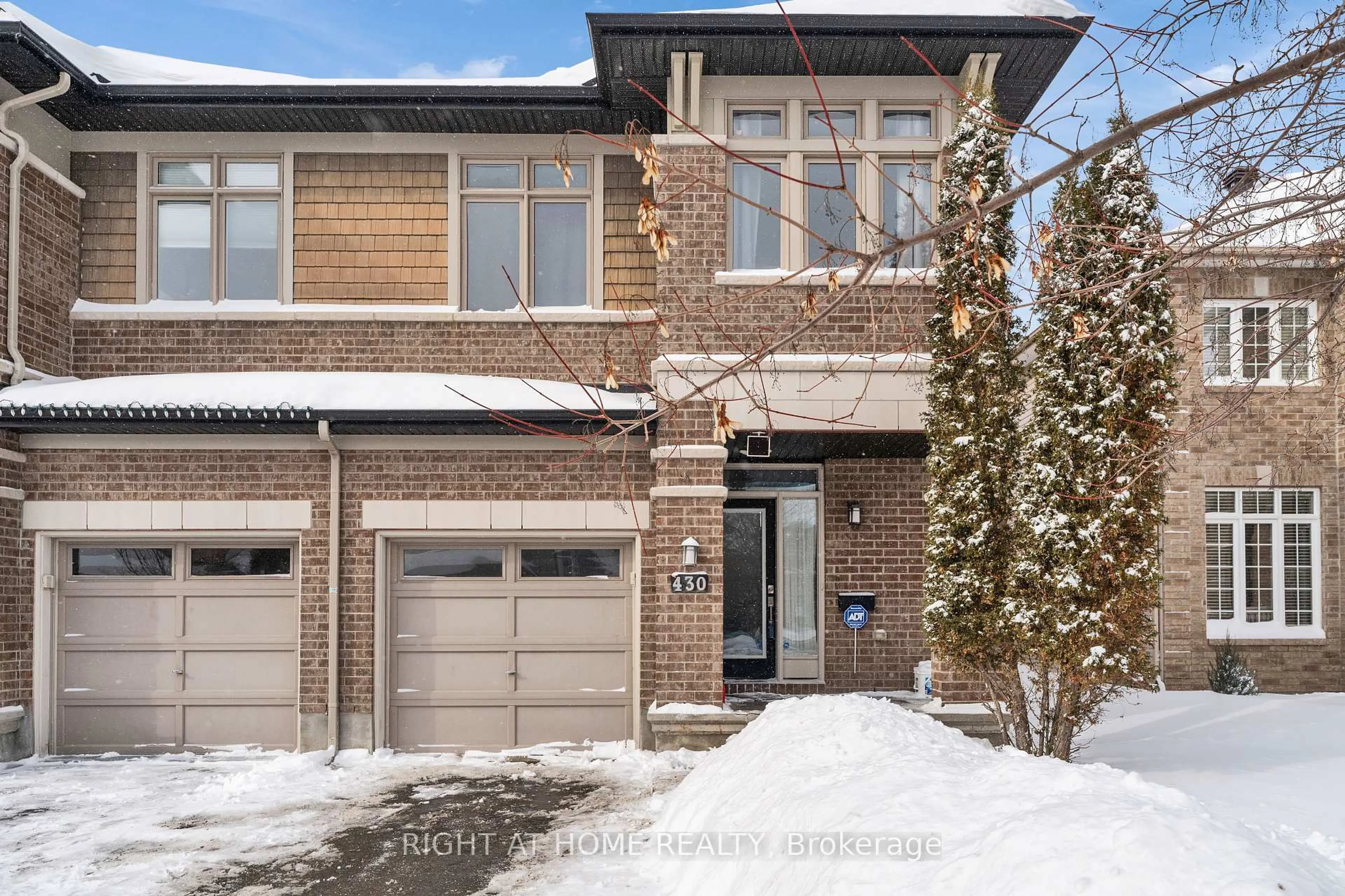 Home with brick exterior material, street for 430 Cooks Mills Cres, Ottawa Ontario K1V 2M9