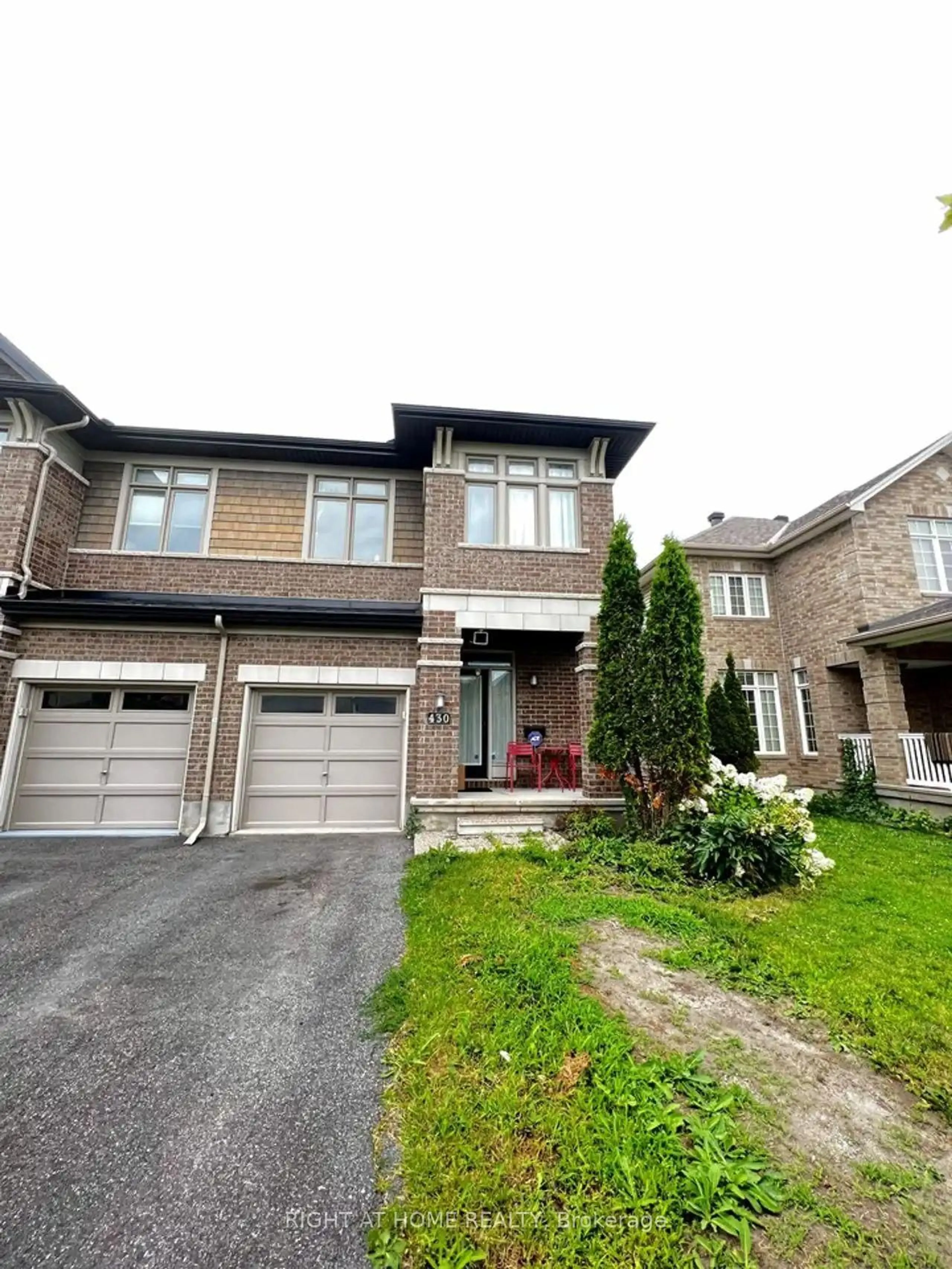 Home with brick exterior material, street for 430 Cooks Mills Cres, Ottawa Ontario K1V 2M9