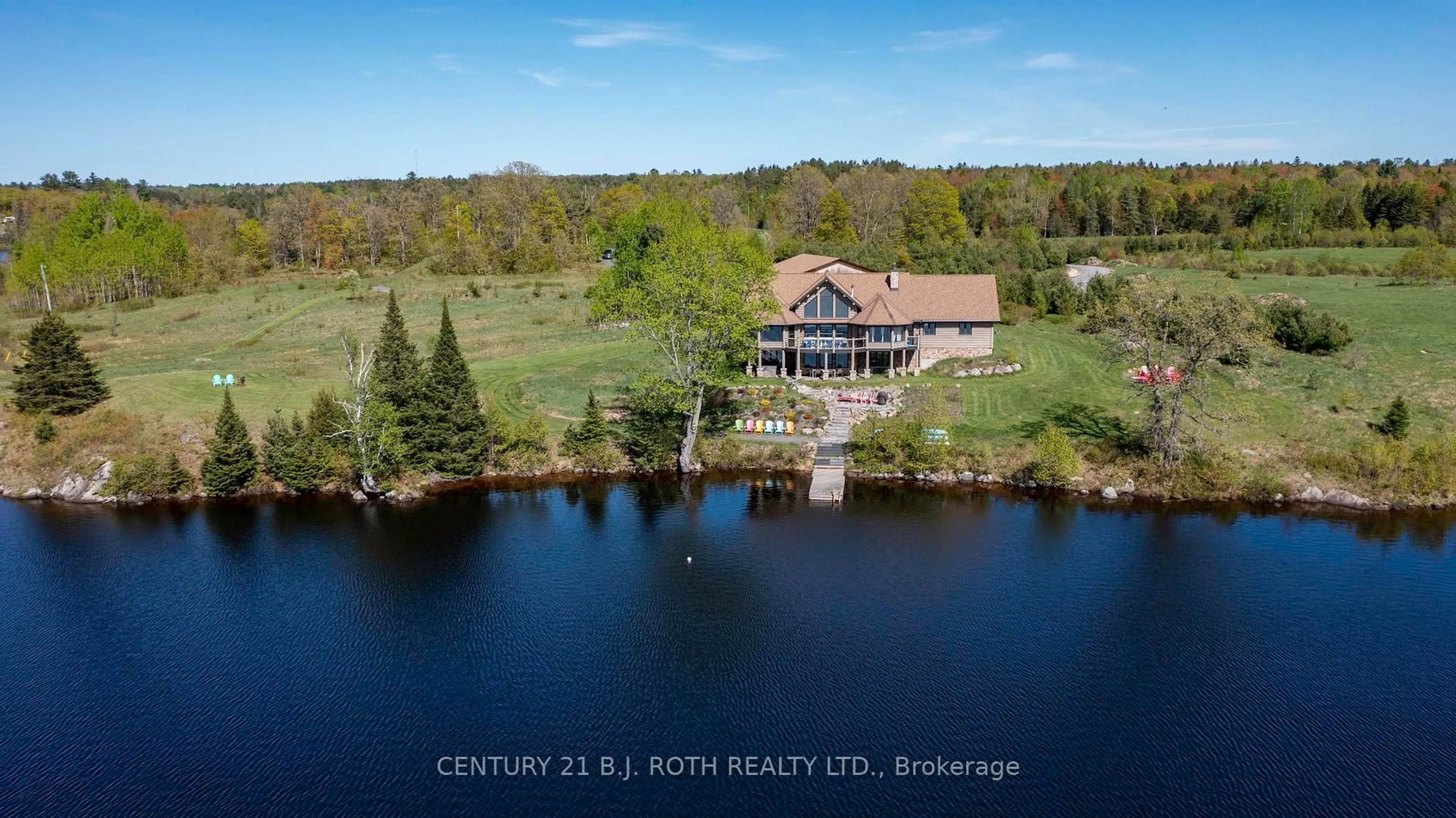 A pic from outside/outdoor area/front of a property/back of a property/a pic from drone, water/lake/river/ocean view for 64 Mccords Rd, McKellar Ontario P2A 0B5