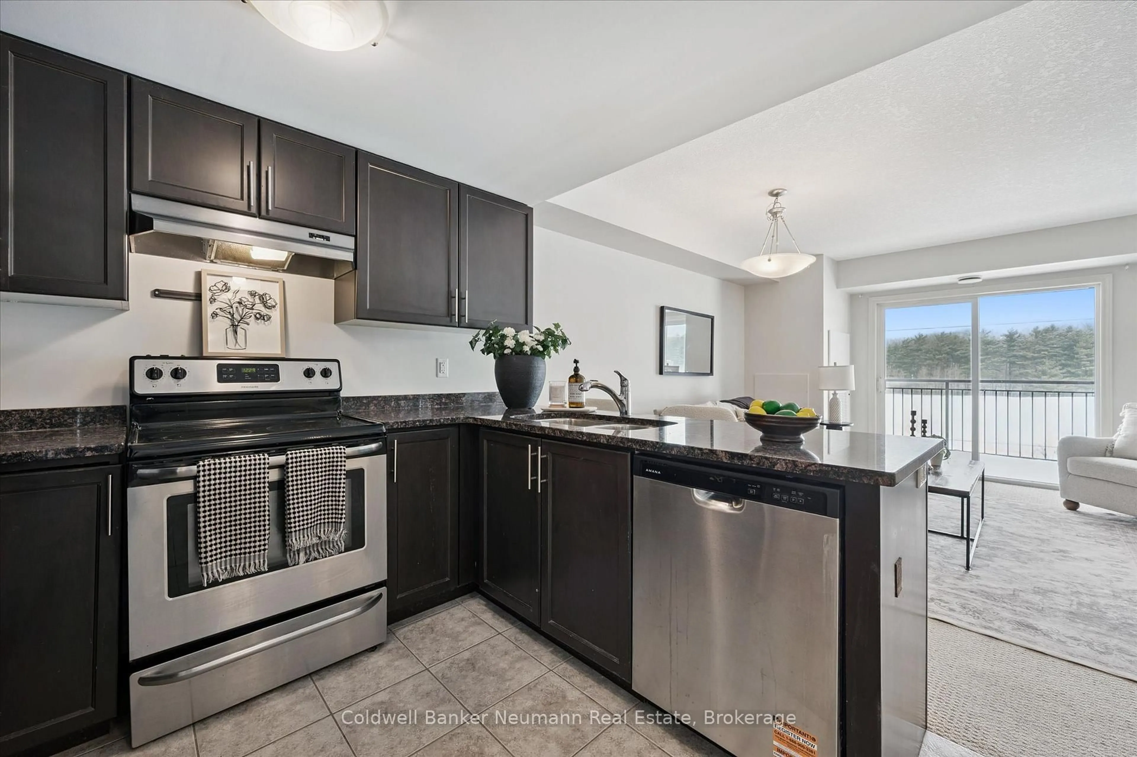 Open concept kitchen, ceramic/tile floor for 45 Kingsbury Sq #406, Guelph Ontario N1L 0L2