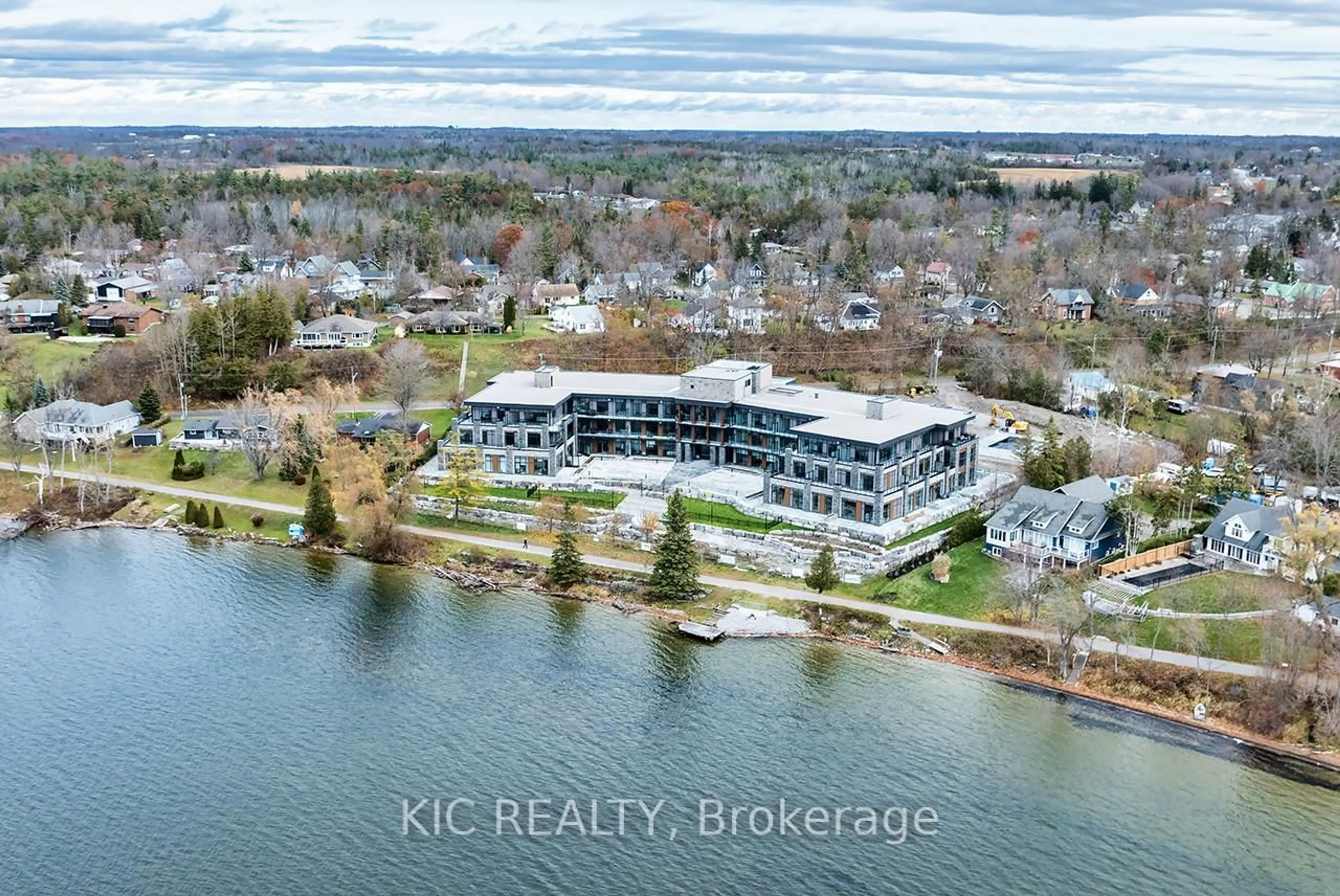 A pic from outside/outdoor area/front of a property/back of a property/a pic from drone, water/lake/river/ocean view for 99 Louisa St #307, Kawartha Lakes Ontario K0M 1N0