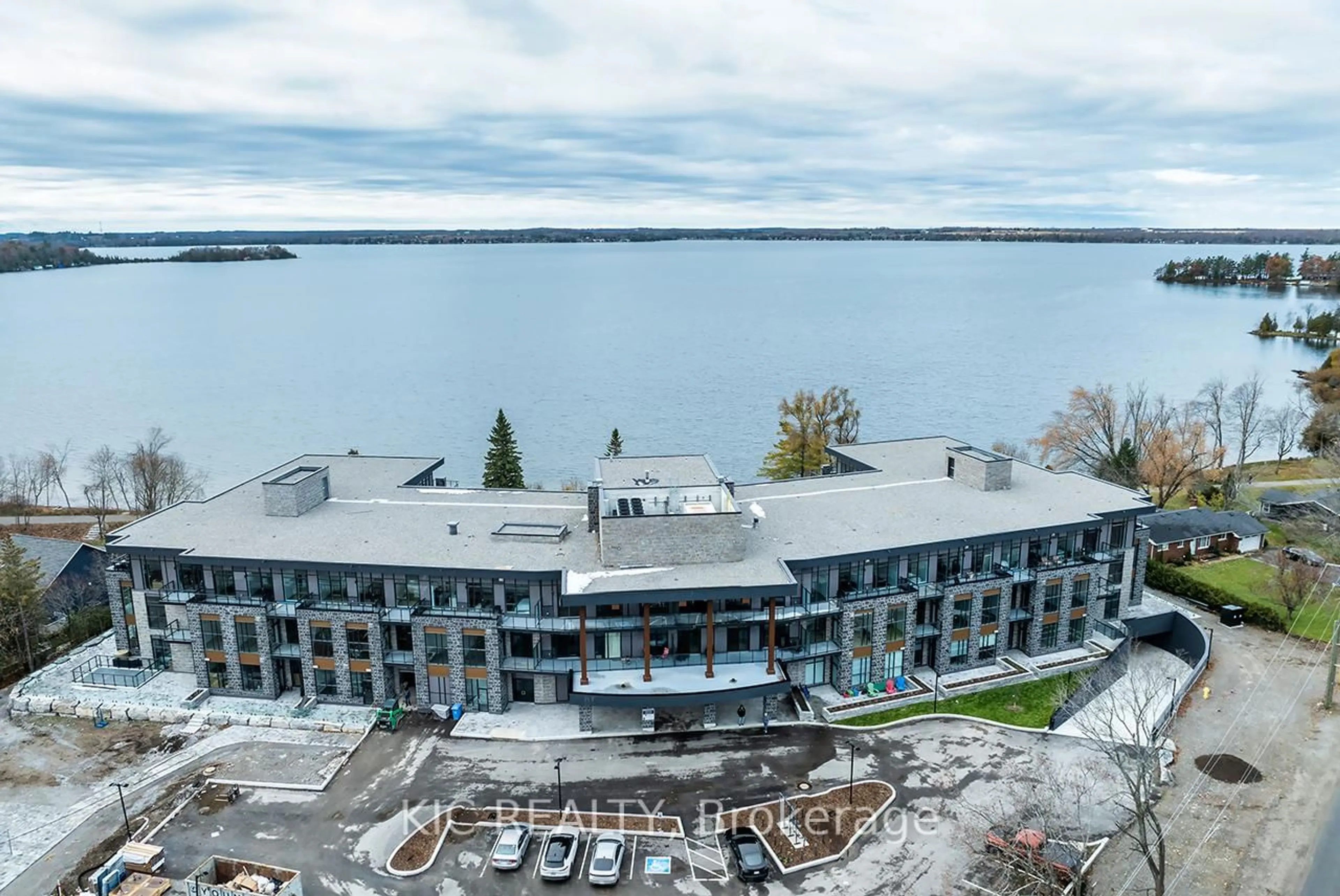 A pic from outside/outdoor area/front of a property/back of a property/a pic from drone, water/lake/river/ocean view for 99 Louisa St #307, Kawartha Lakes Ontario K0M 1N0