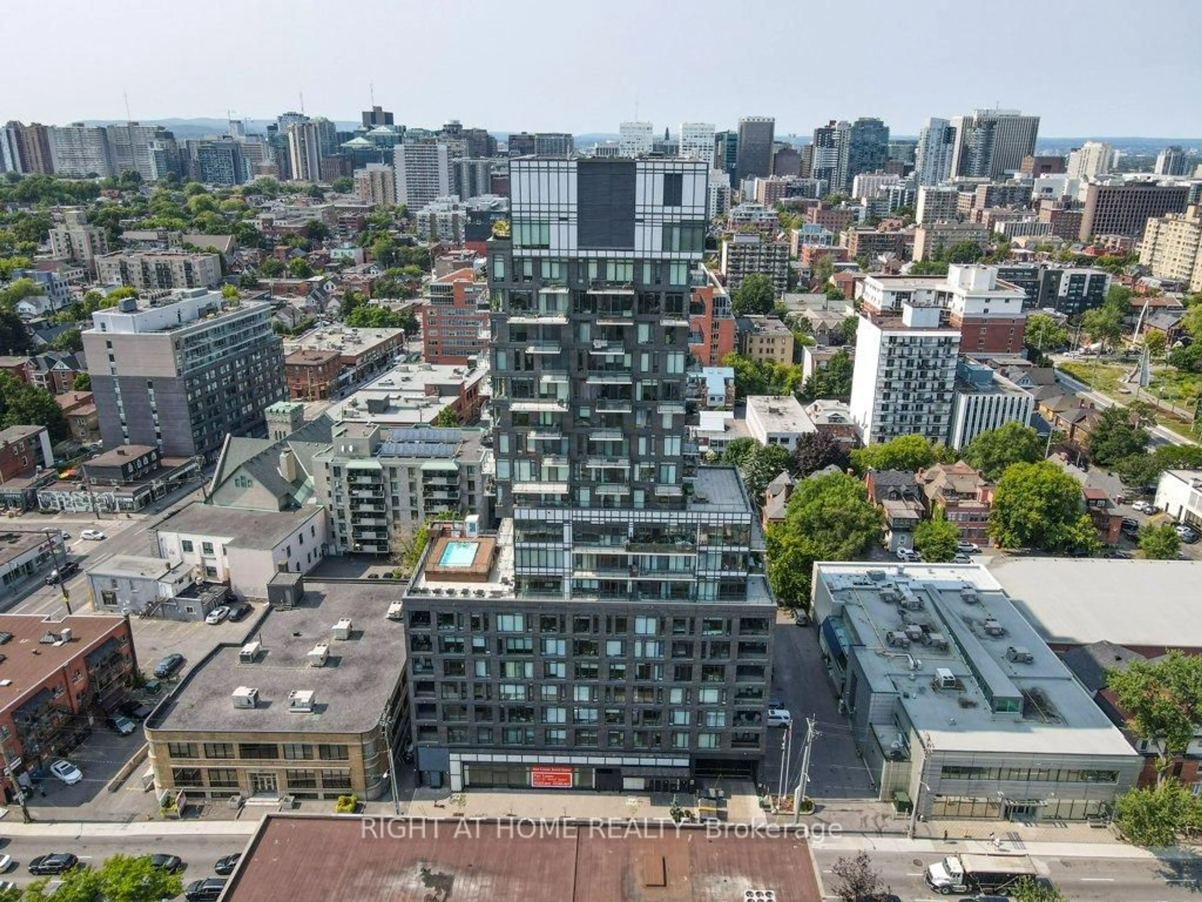 A pic from outside/outdoor area/front of a property/back of a property/a pic from drone, city buildings view from balcony for 203 Catherine St #2002, Ottawa Ontario K2P 1J5