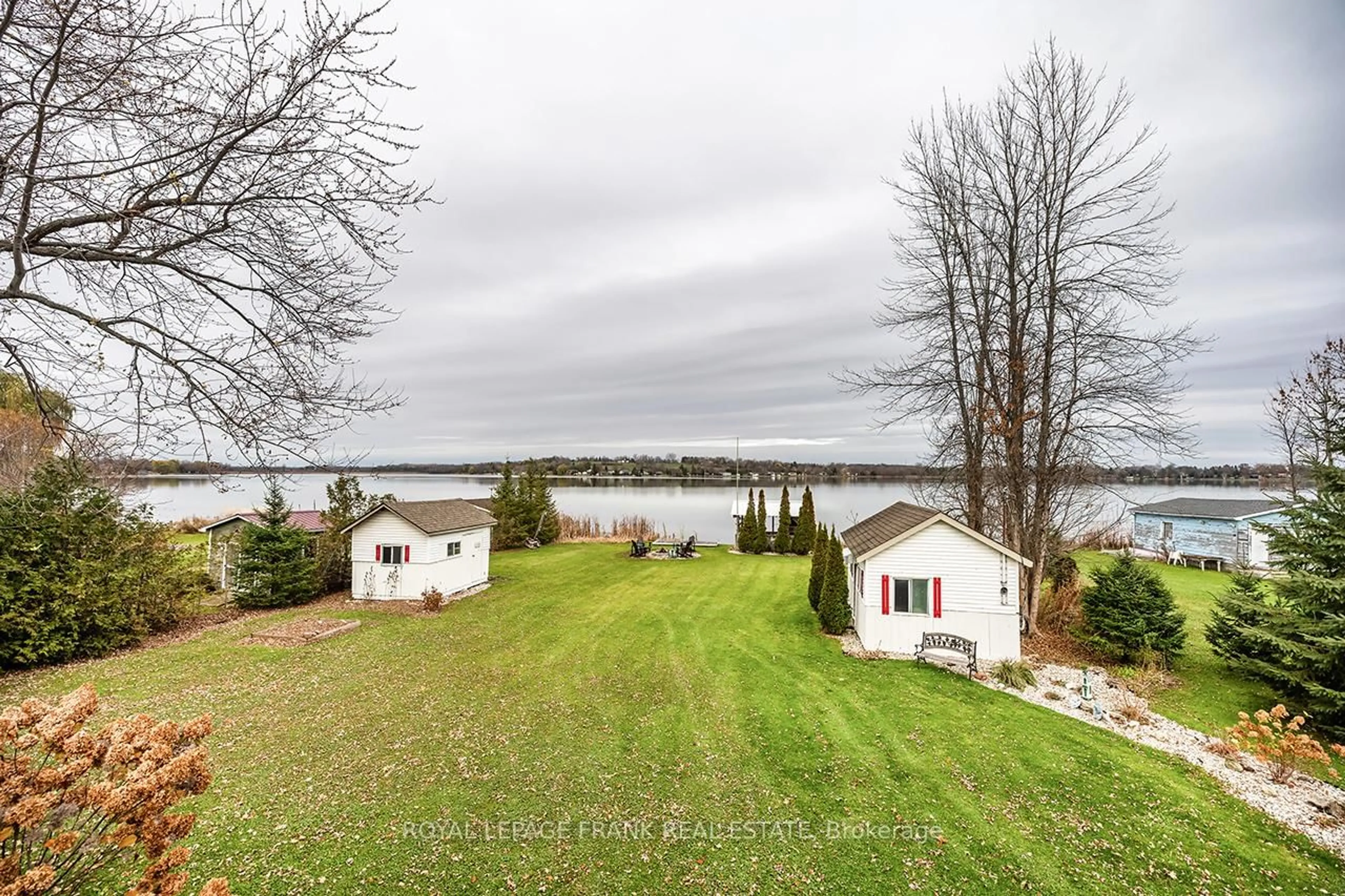 A pic from outside/outdoor area/front of a property/back of a property/a pic from drone, water/lake/river/ocean view for 25 Shelley Dr, Kawartha Lakes Ontario K0M 2C0