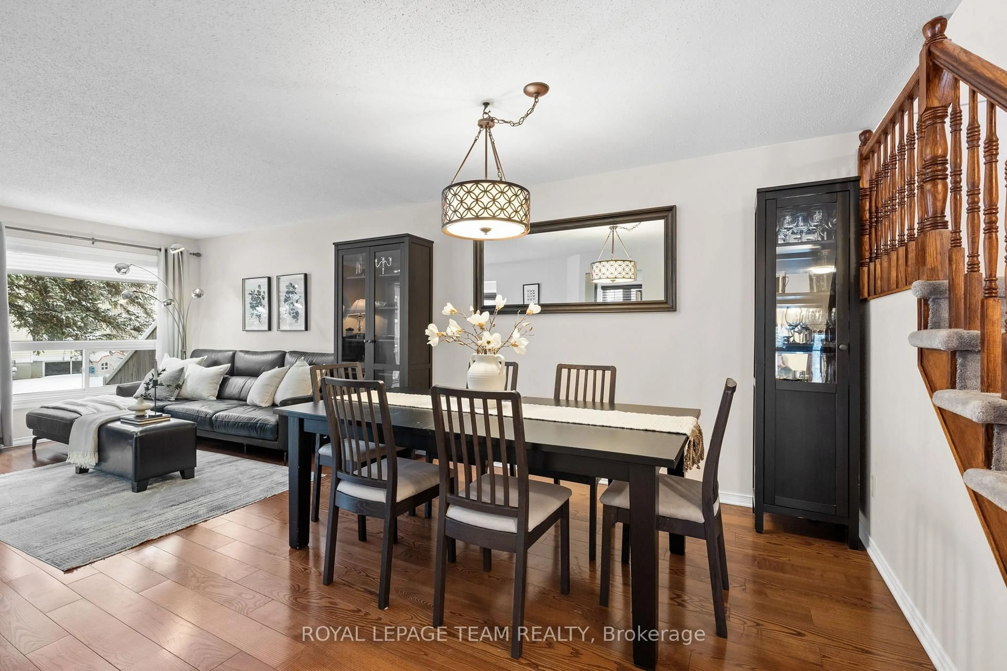 Dining room, wood/laminate floor for 27 Sandcliffe Terr, Ottawa Ontario K2G 5Y2