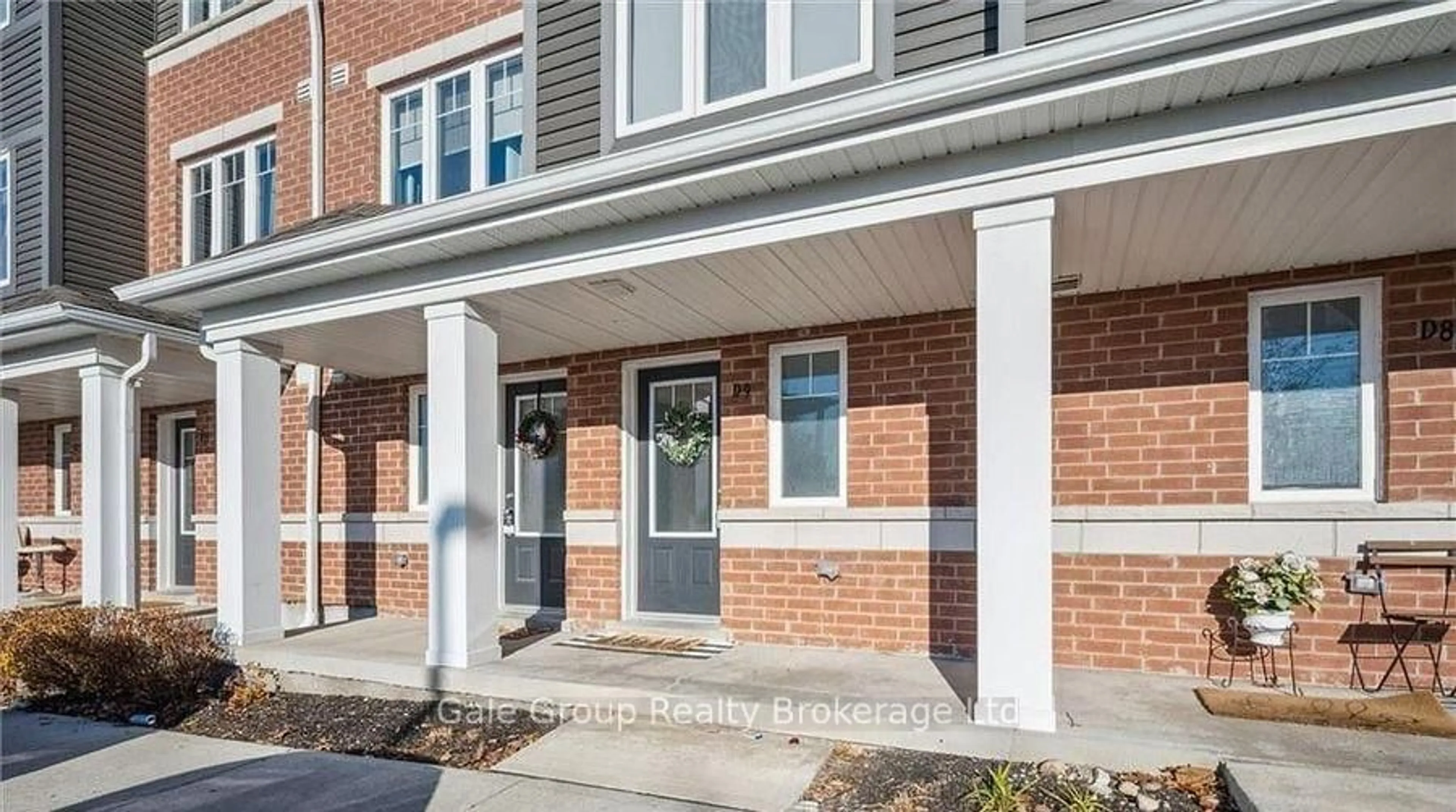 Home with brick exterior material, street for 24 Morrison Rd #D9, Kitchener Ontario N2A 2W7