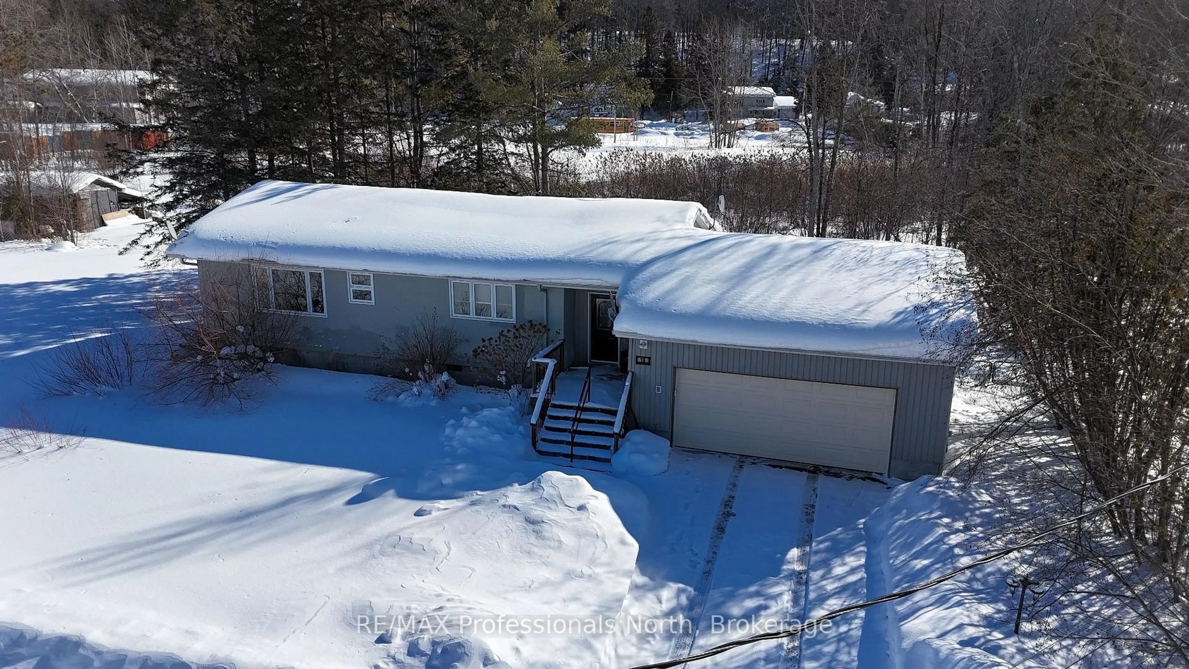 A pic from outside/outdoor area/front of a property/back of a property/a pic from drone, street for 16 Anson St, Minden Hills Ontario K0M 2K0