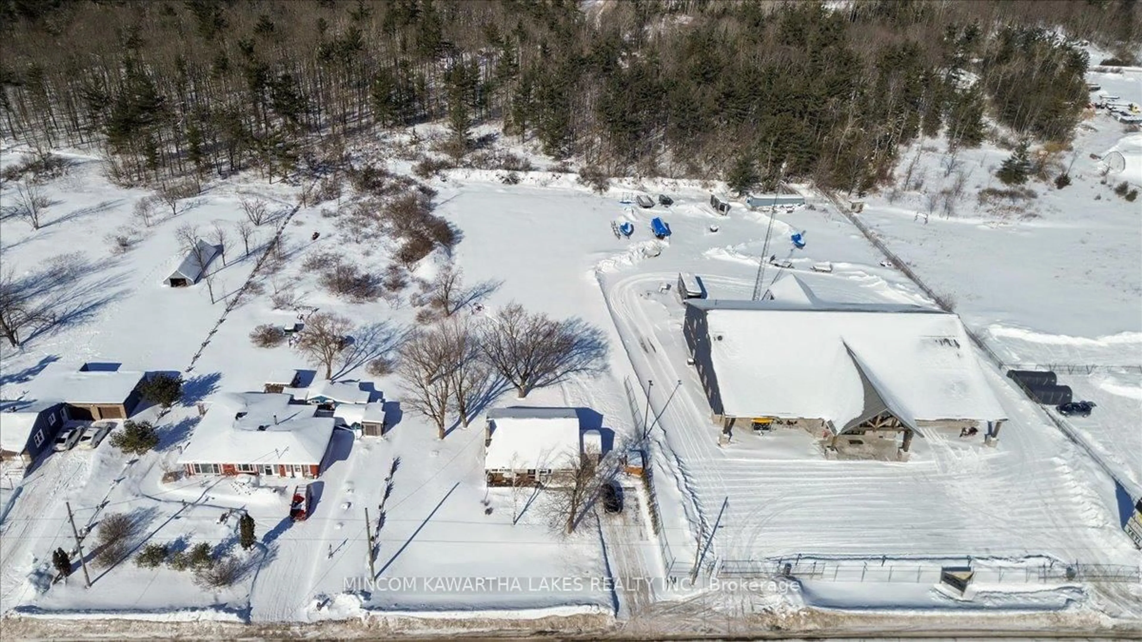 A pic from outside/outdoor area/front of a property/back of a property/a pic from drone, street for 102313 Highway 7, Limoges Ontario K0K 2M0