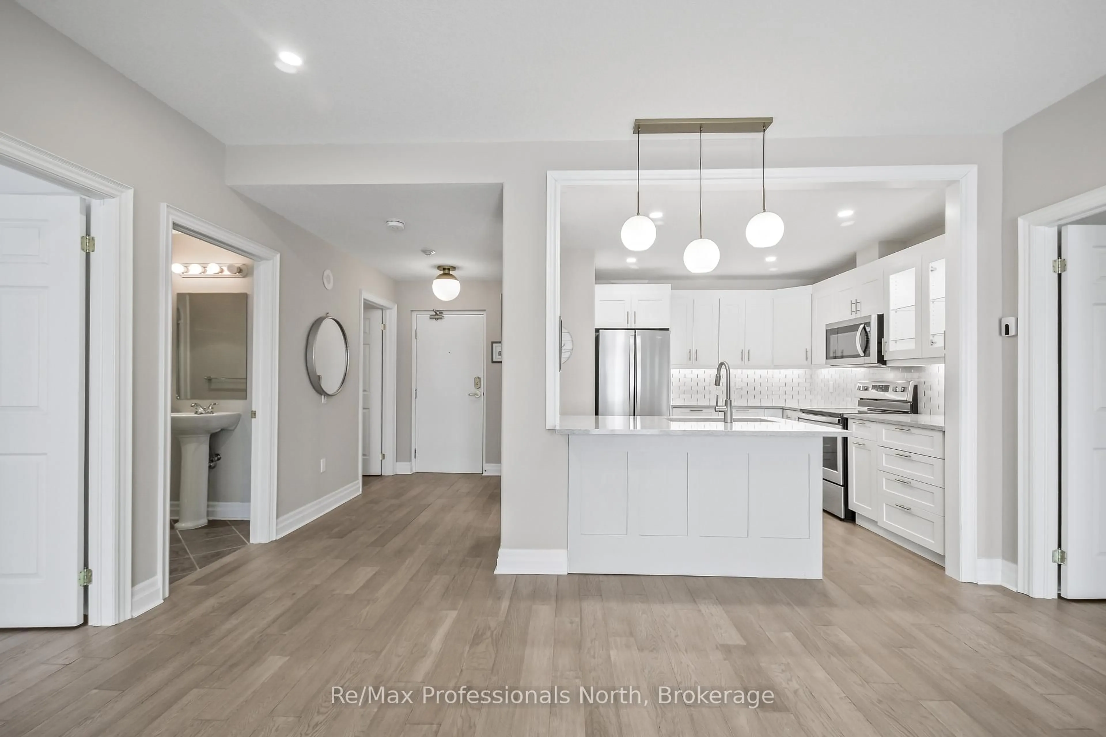 Open concept kitchen, unknown for 110 Steamship Bay Rd #403, Gravenhurst Ontario P1P 1Z9