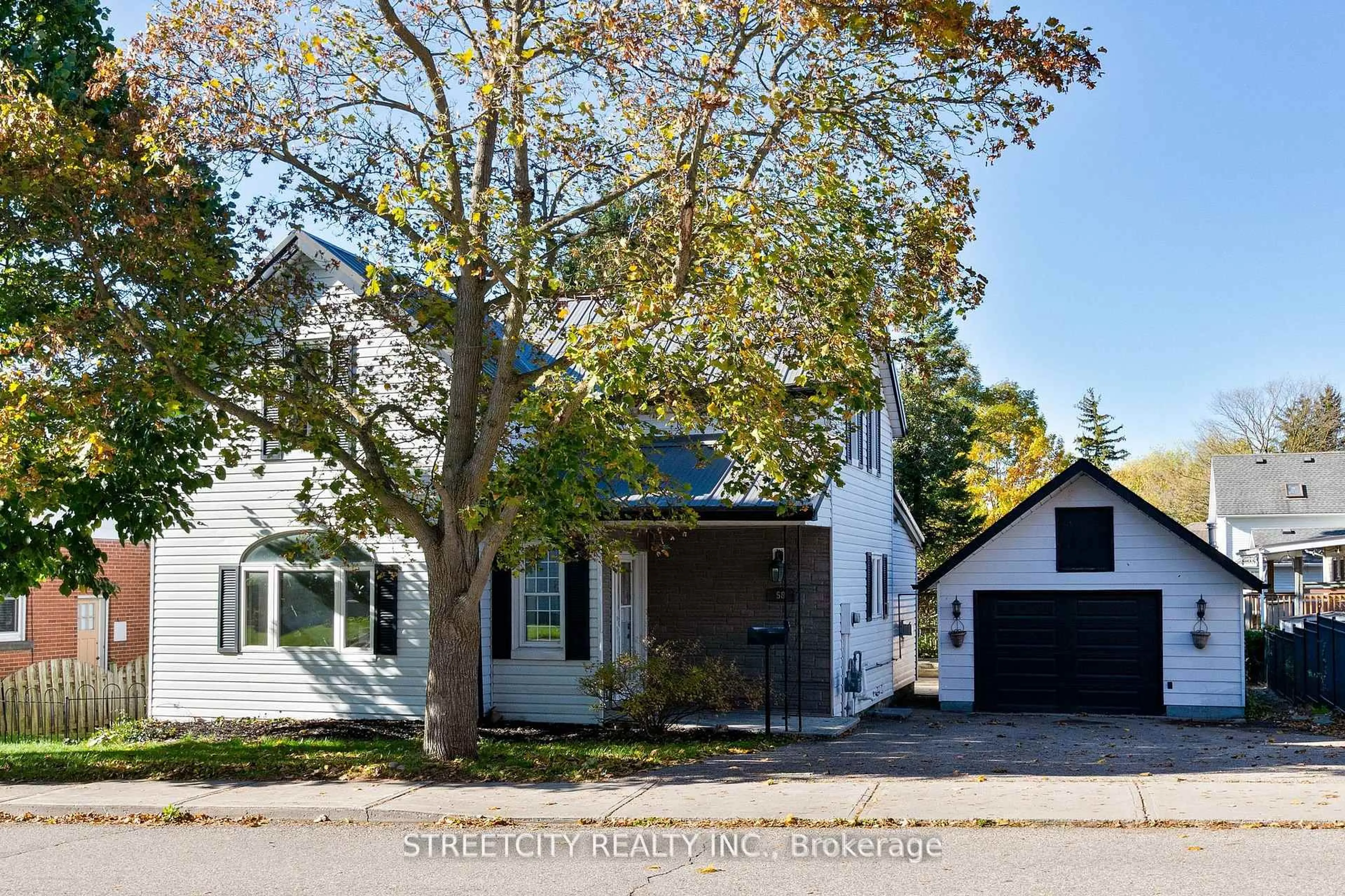 Home with vinyl exterior material, street for 58 Norwich Ave, Woodstock Ontario N4S 3V2