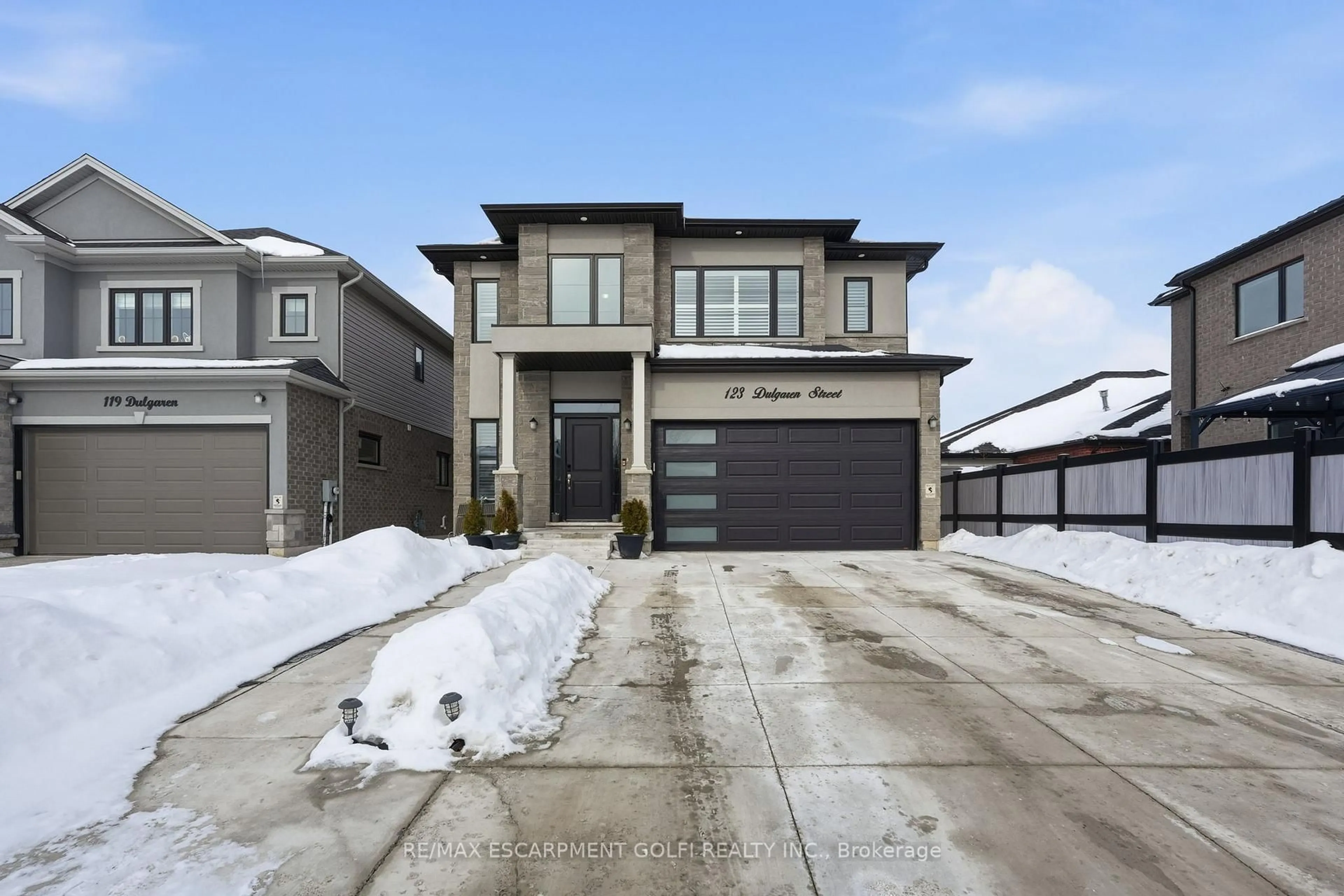 Home with brick exterior material, street for 123 Dulgaren St, Hamilton Ontario L8W 3J5