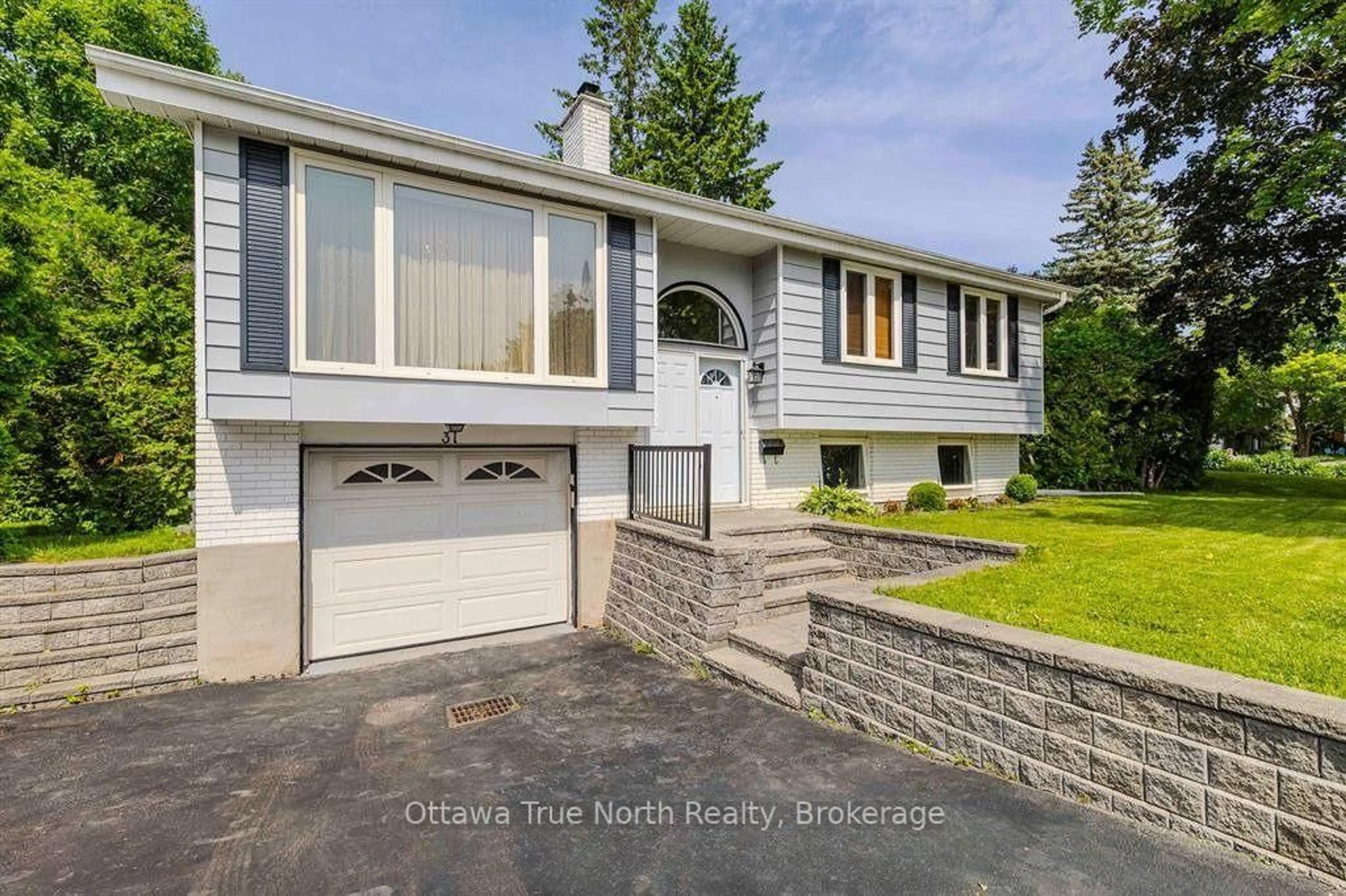 Home with vinyl exterior material, street for 31 Ashgrove Cres, Ottawa Ontario K2G 0S1