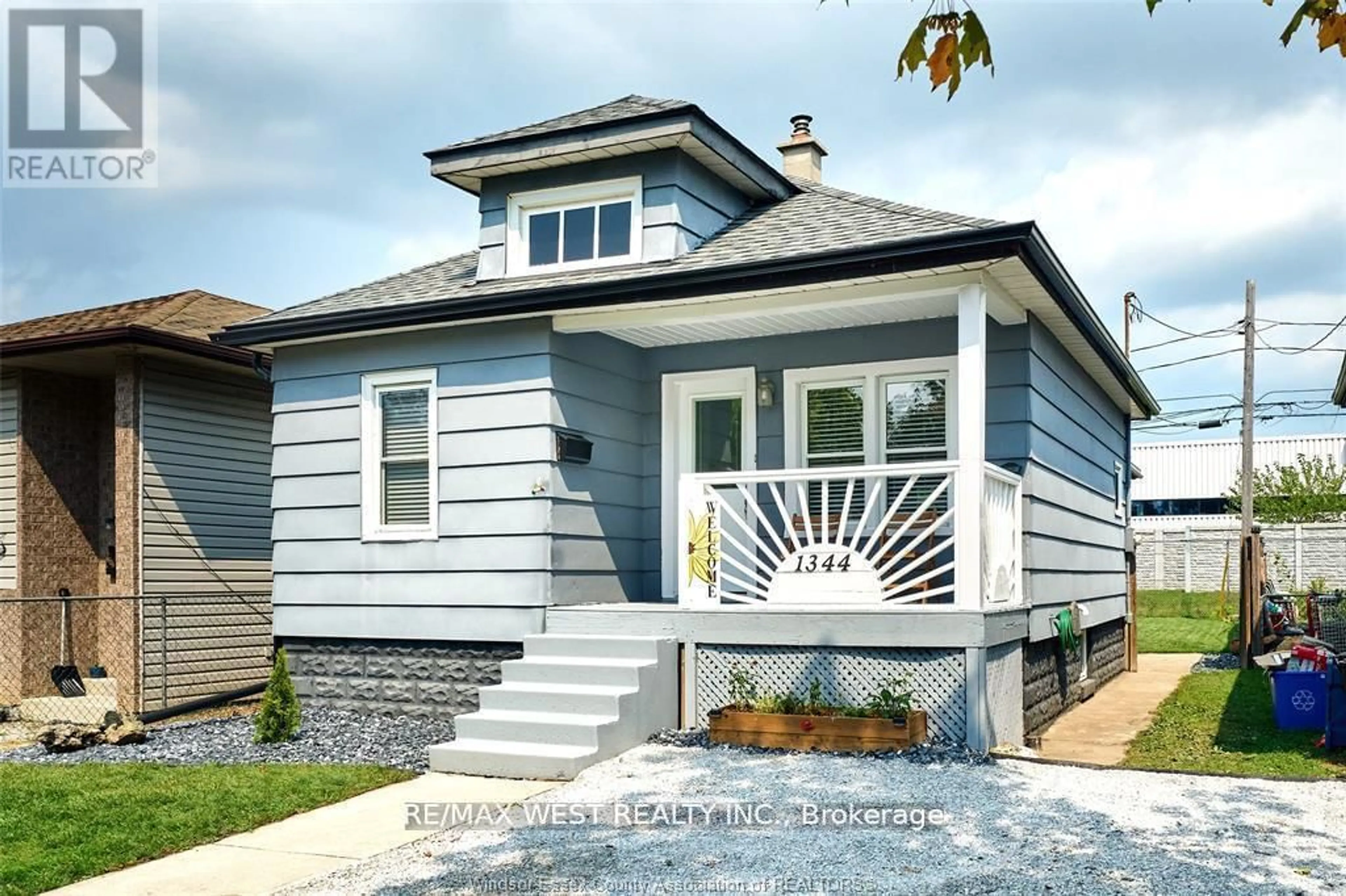 Home with vinyl exterior material, street for 1344 Henry Ford Centre Dr, Windsor Ontario N8Y 2T8