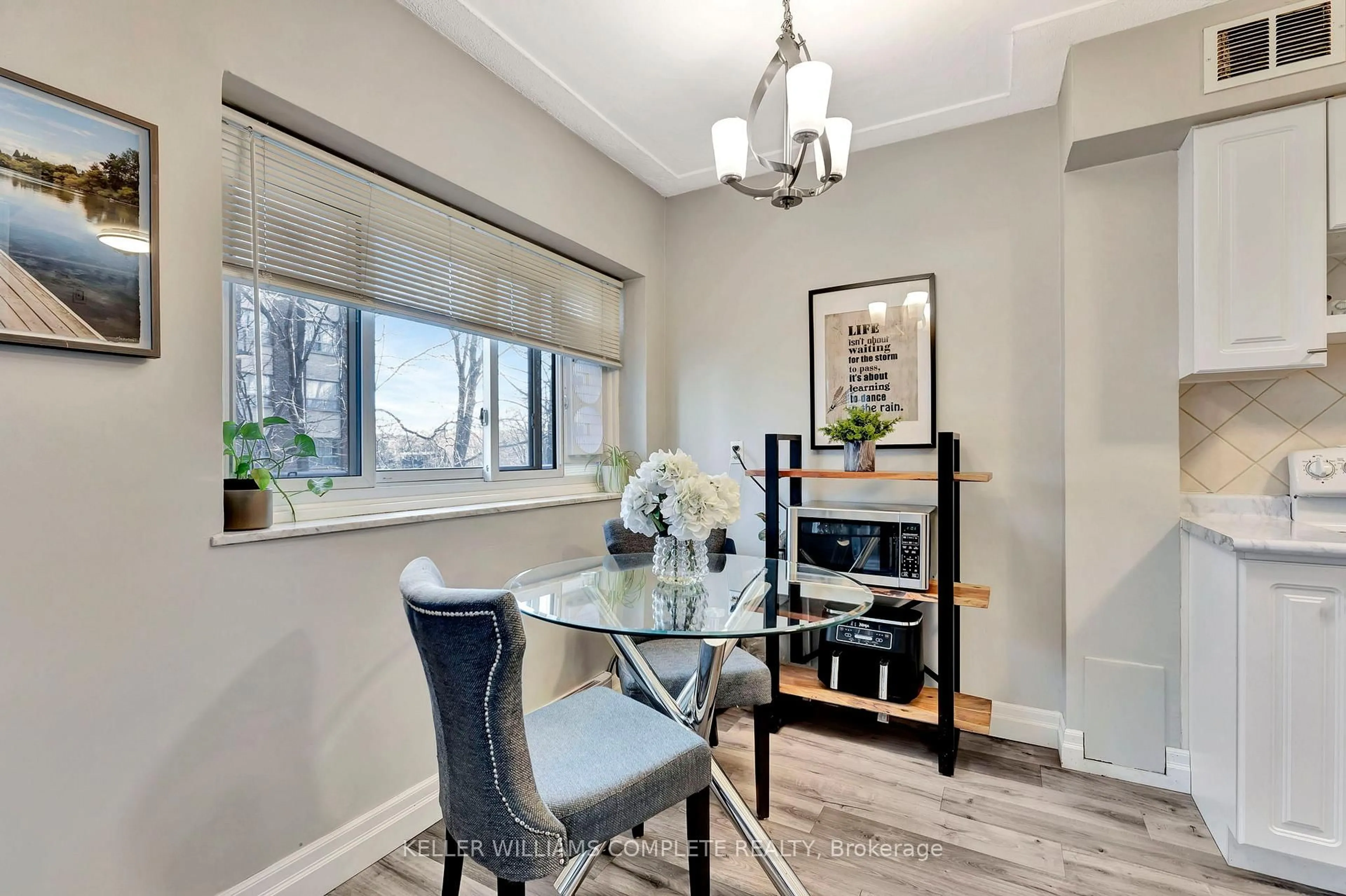 Dining room, wood/laminate floor for 11 Woodman Dr #307, Hamilton Ontario L8K 4E3