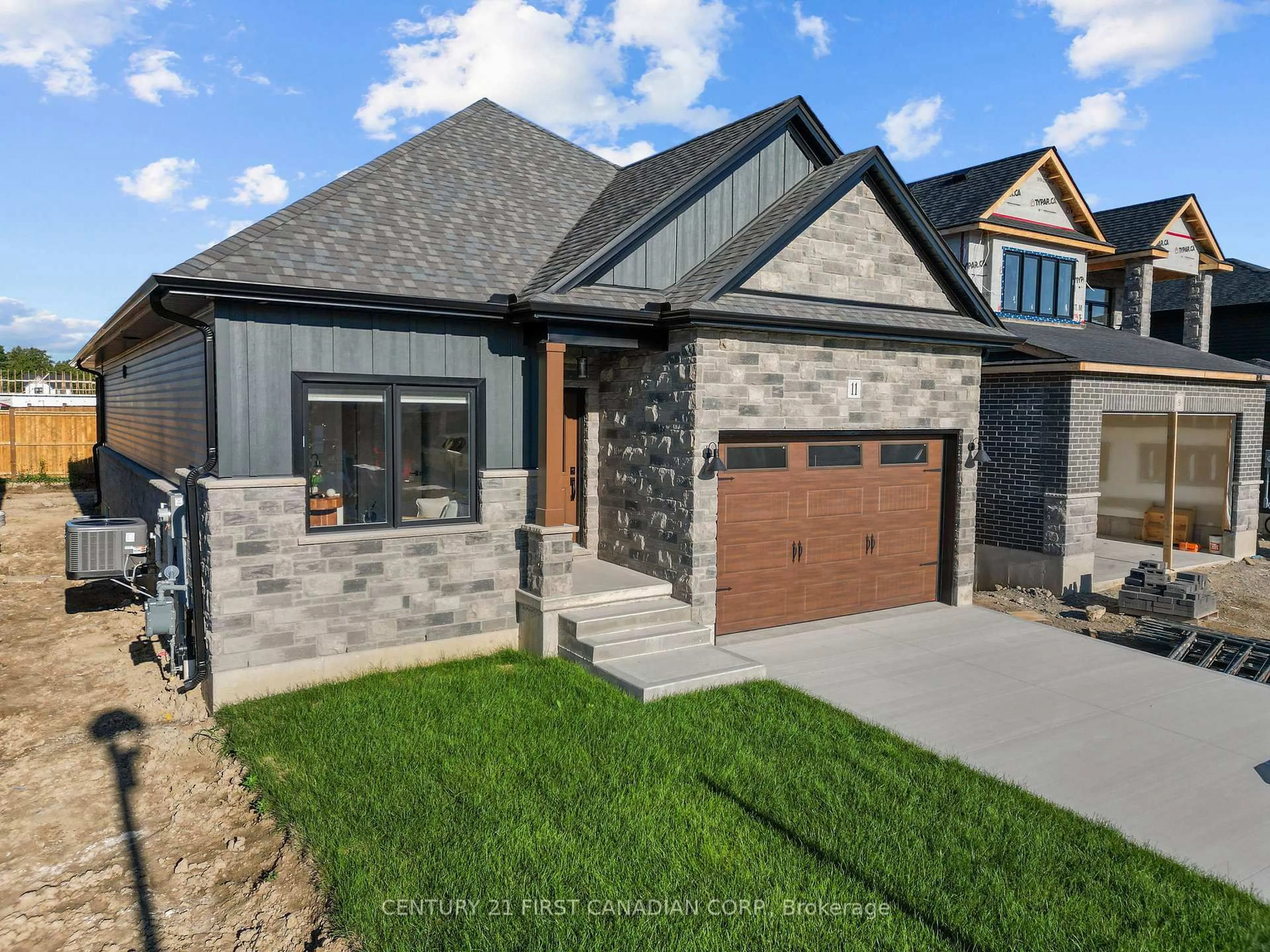 Home with brick exterior material, street for 11 Sheldabren St, North Middlesex Ontario N0M 1A0