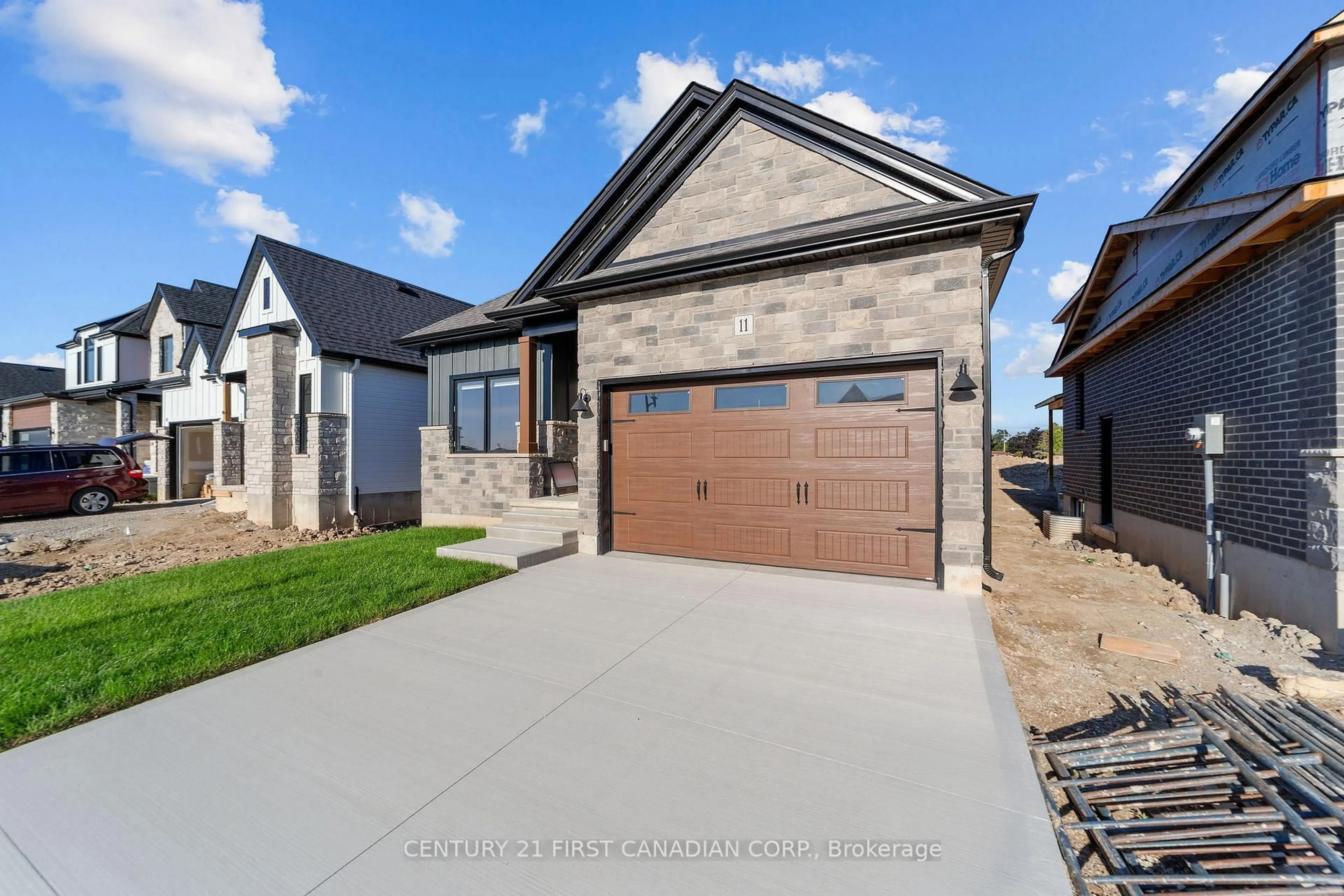 Home with brick exterior material, street for 11 Sheldabren St, North Middlesex Ontario N0M 1A0