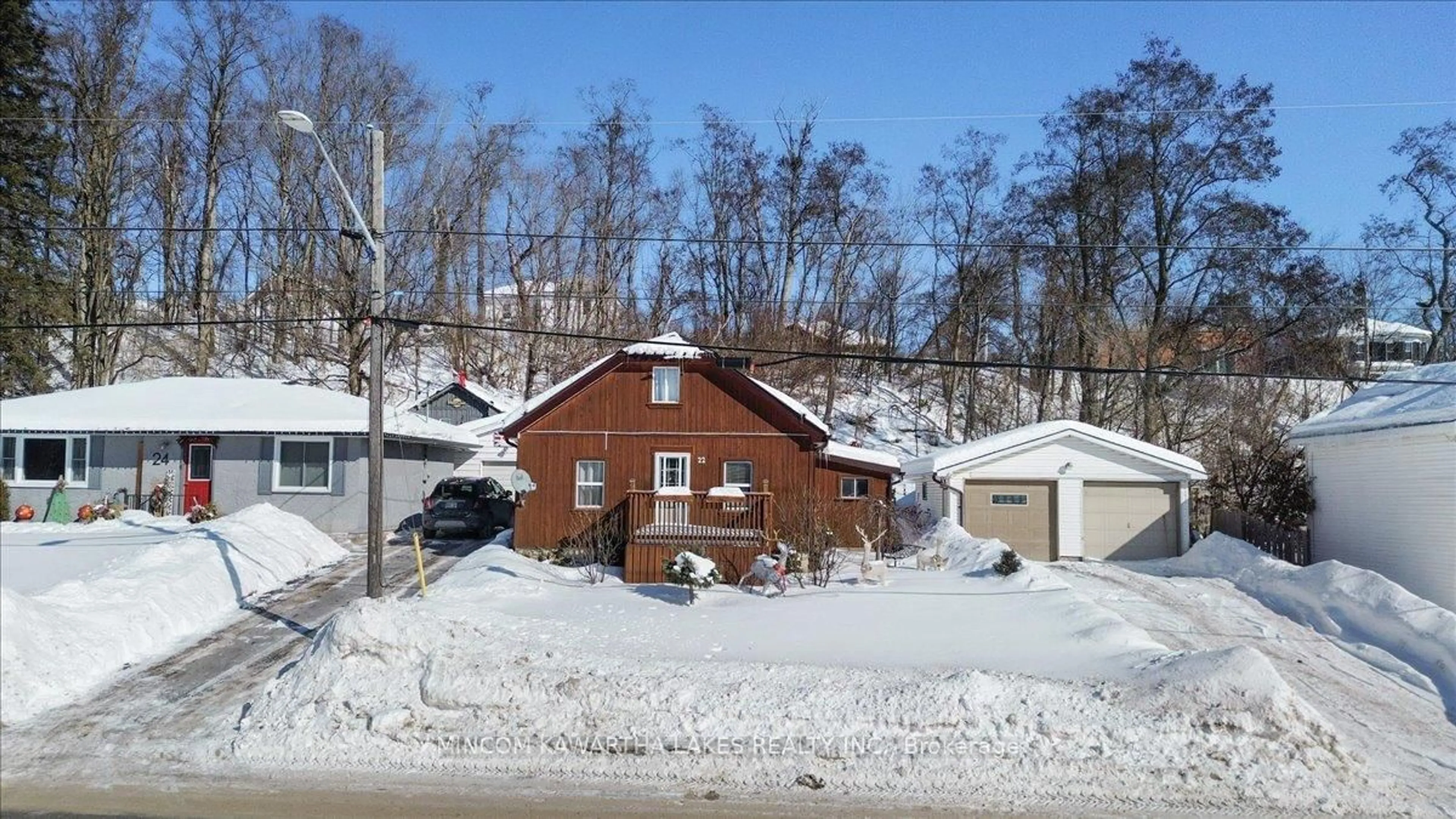 A pic from outside/outdoor area/front of a property/back of a property/a pic from drone, street for 22 Main St, Limoges Ontario K0K 2M0