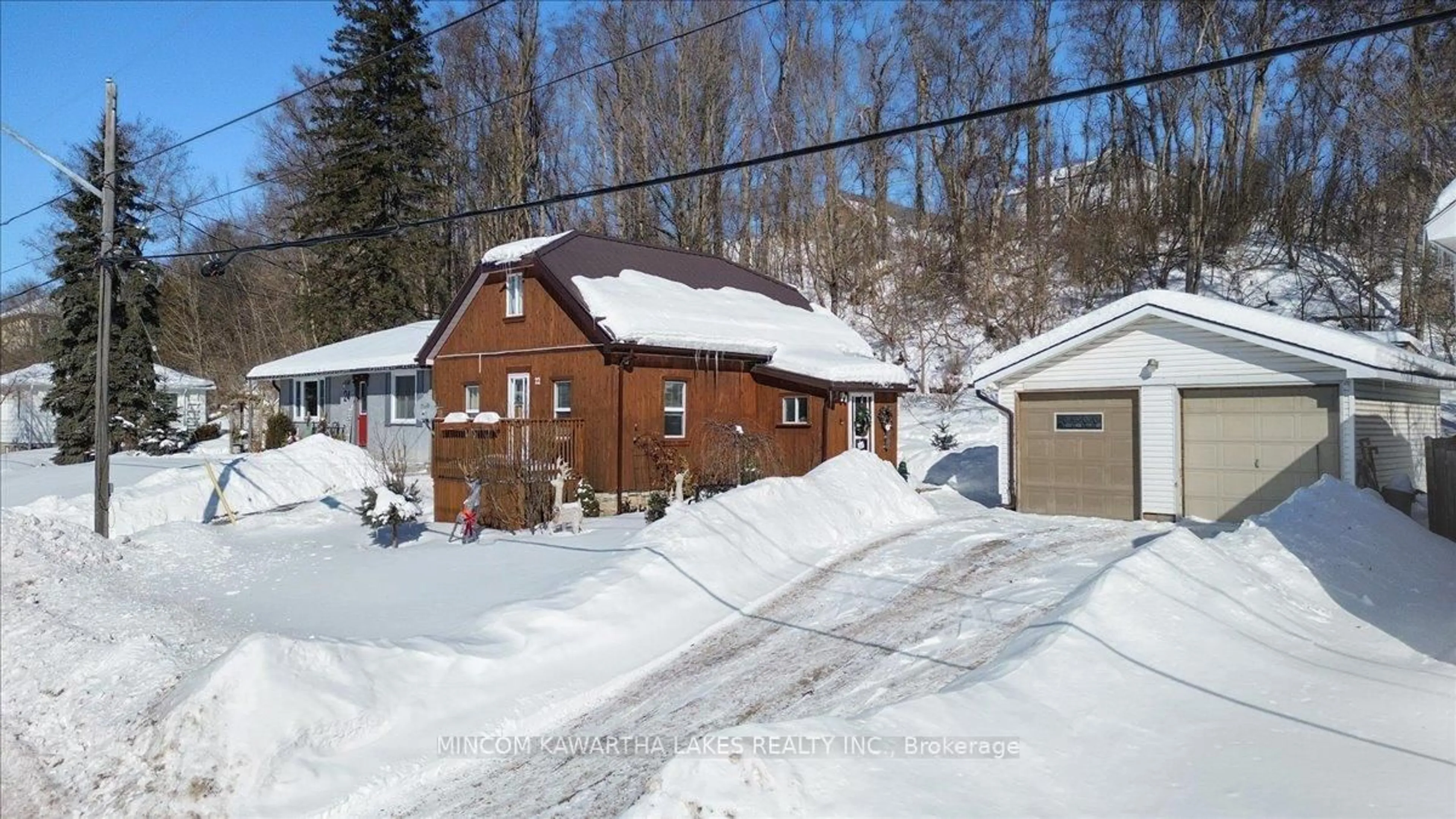 A pic from outside/outdoor area/front of a property/back of a property/a pic from drone, street for 22 Main St, Limoges Ontario K0K 2M0