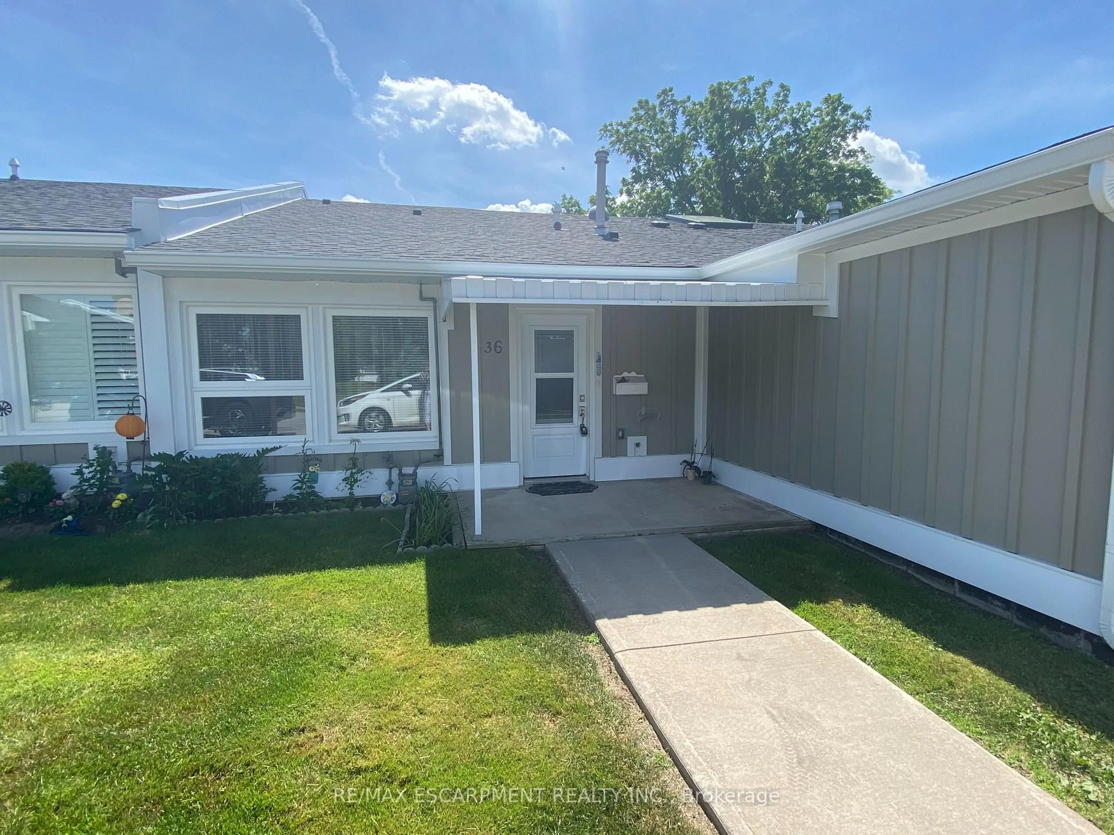 Home with vinyl exterior material, street for 36 McKenna Crt, Hamilton Ontario L9B 1T8