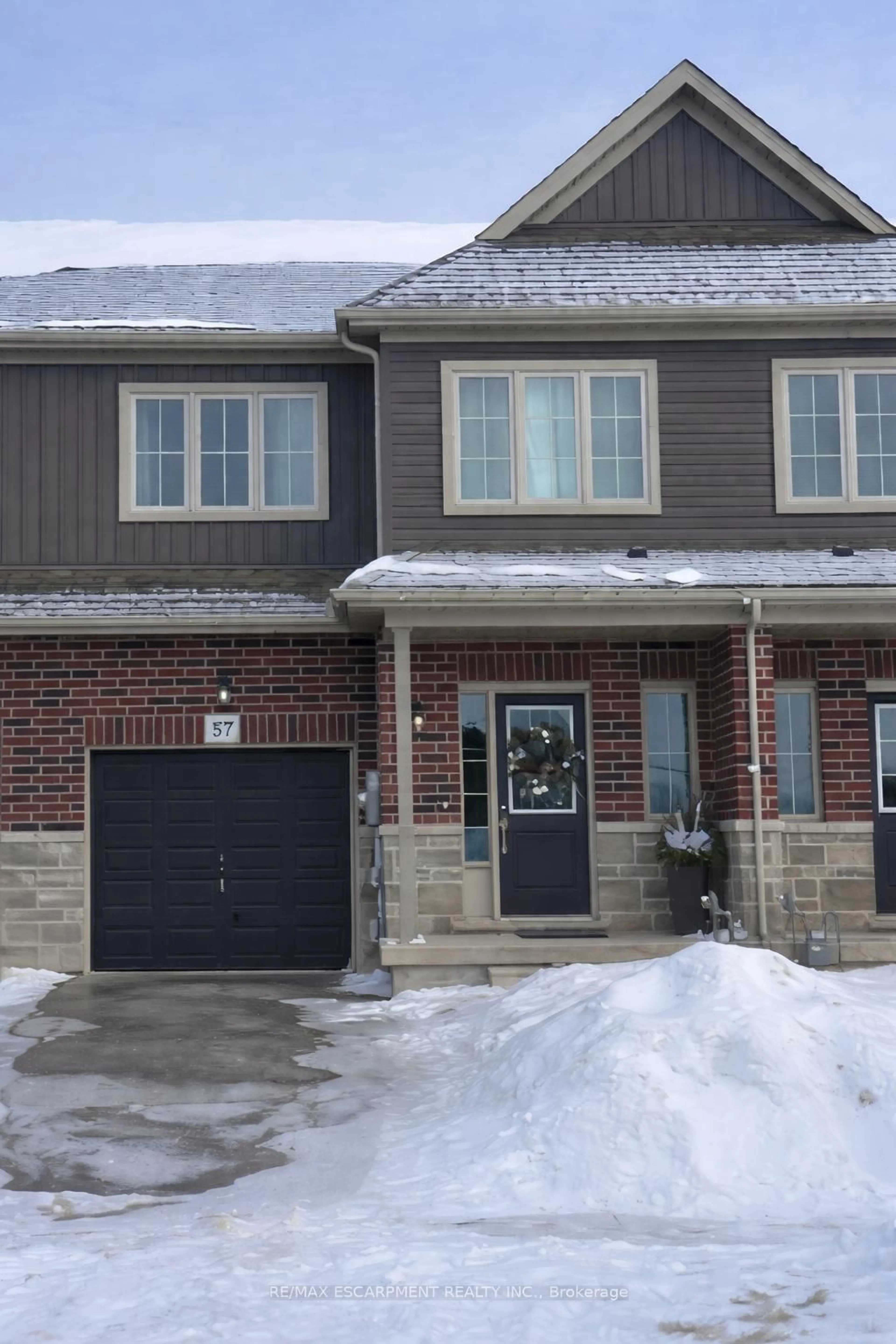 Home with brick exterior material, street for 57 Lloyd Davies Way, Hamilton Ontario L0R 1C0
