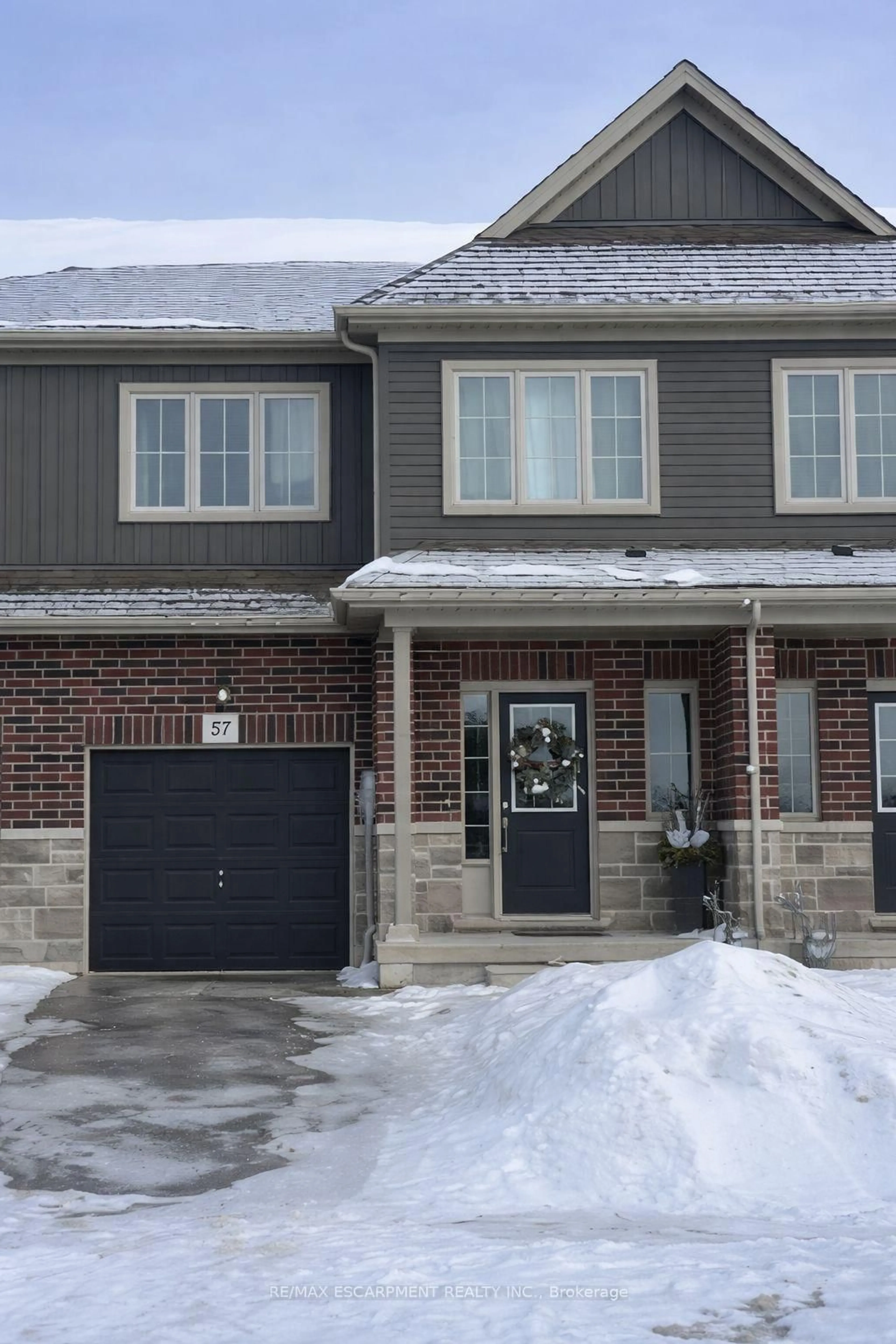 Home with brick exterior material, street for 57 Lloyd Davies Way, Hamilton Ontario L0R 1C0
