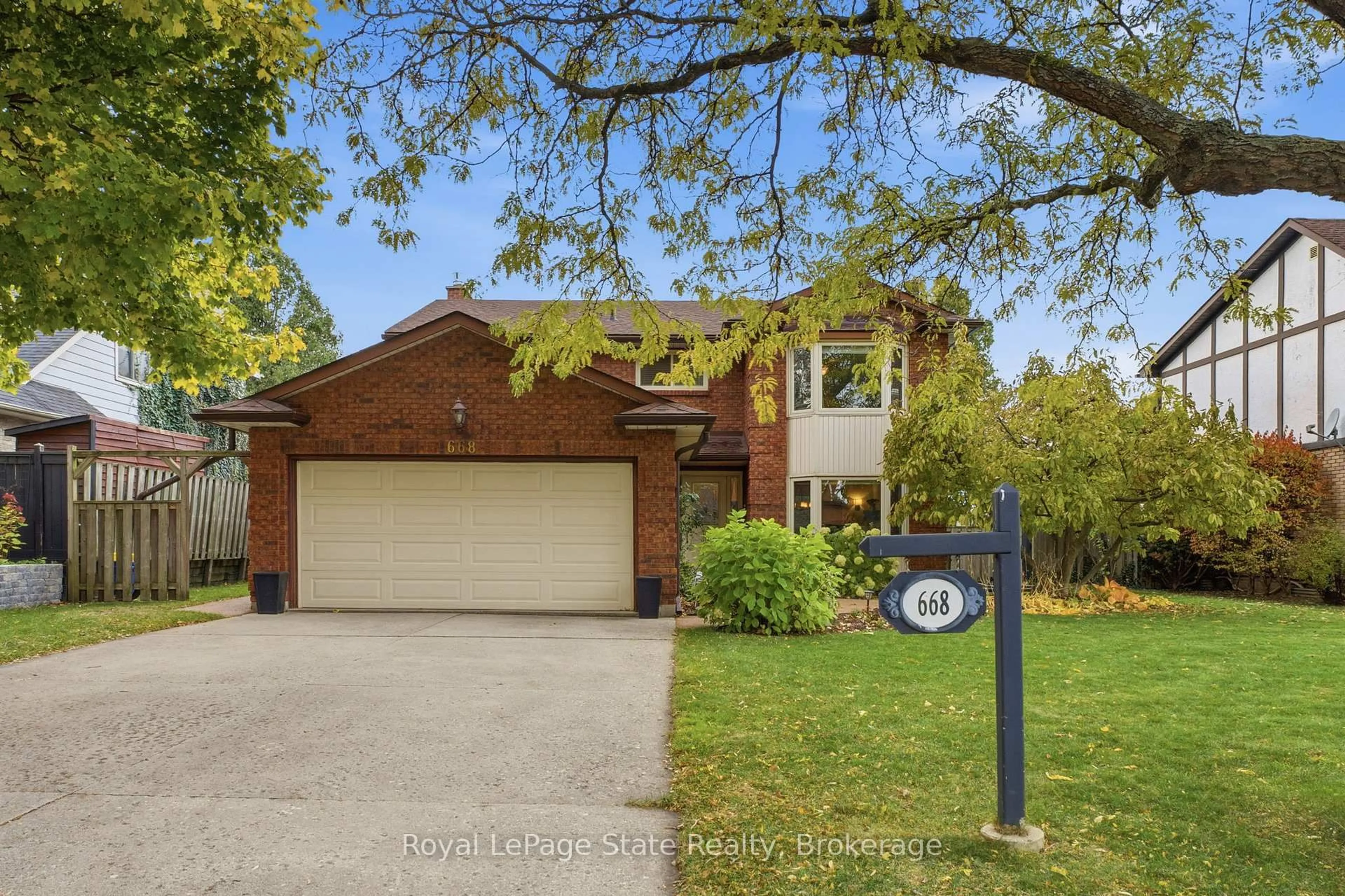 Home with brick exterior material, street for 668 Tomahawk Cres, Hamilton Ontario L9G 3R2