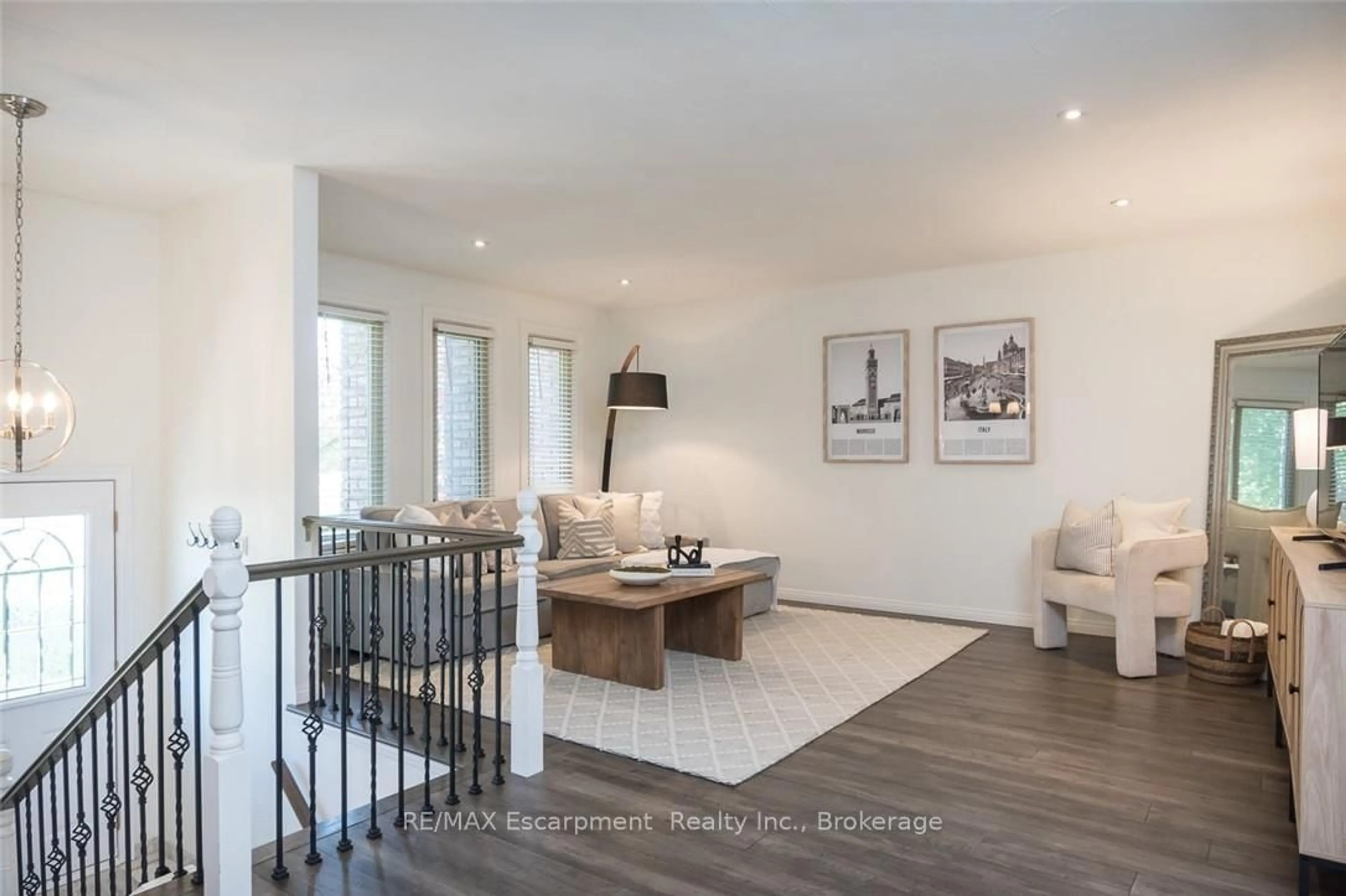 Living room with furniture, wood/laminate floor for 45 AMBERWOOD St, Hamilton Ontario L8J 1J1