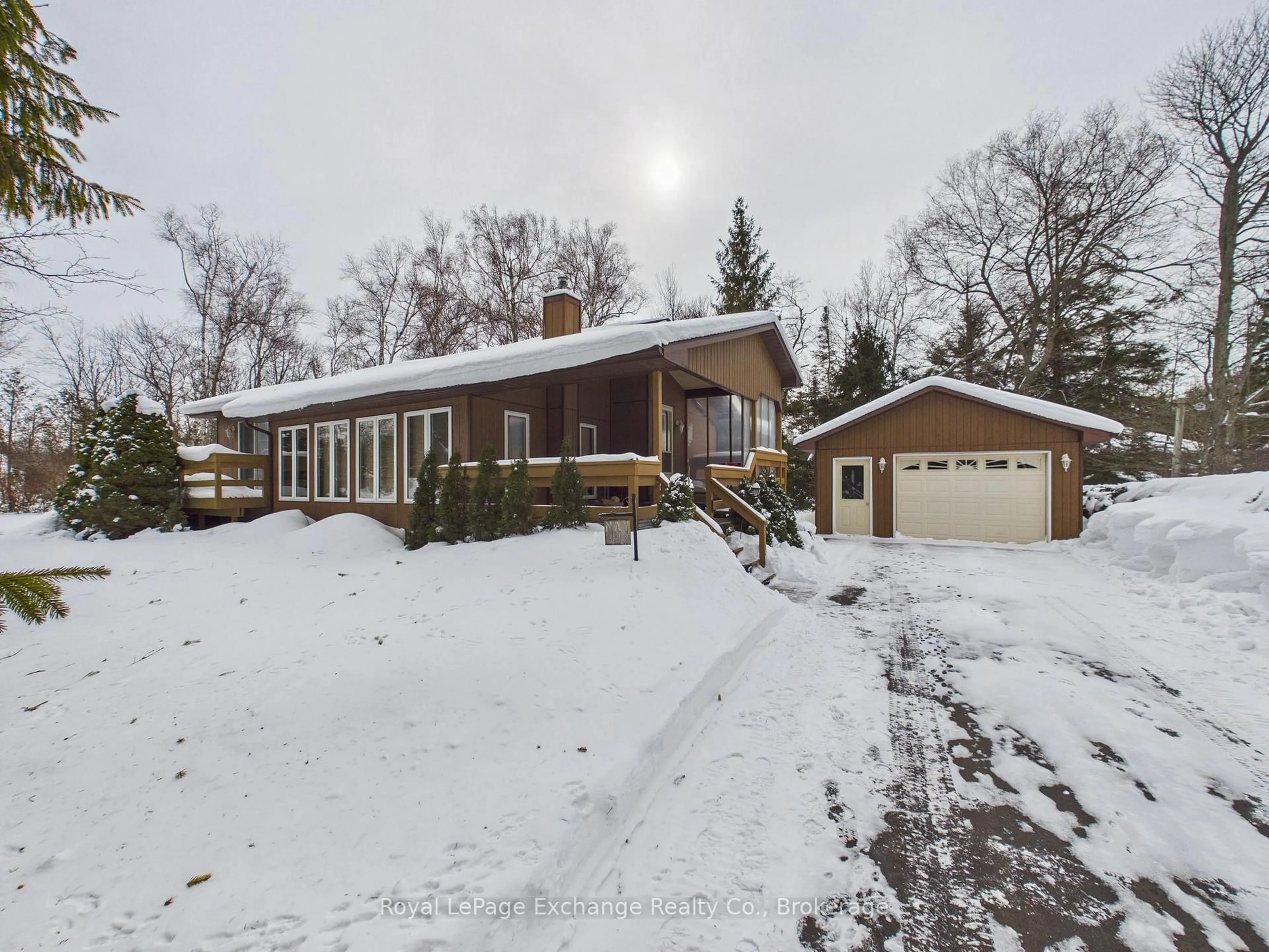 A pic from outside/outdoor area/front of a property/back of a property/a pic from drone, street for 323 Tyendinaga Rd, Huron-Kinloss Ontario N2Z 2X3