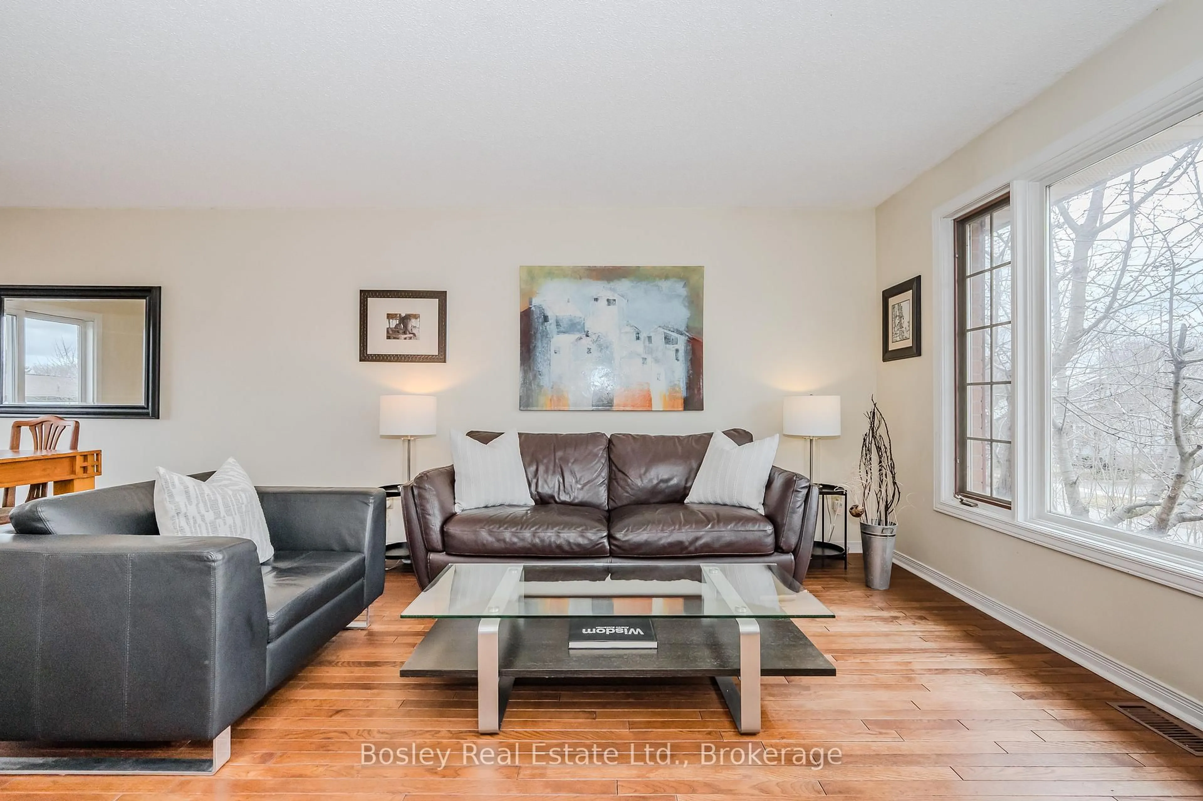Living room with furniture, wood/laminate floor for 26 Brazolot Dr, Guelph Ontario N1G 4K8