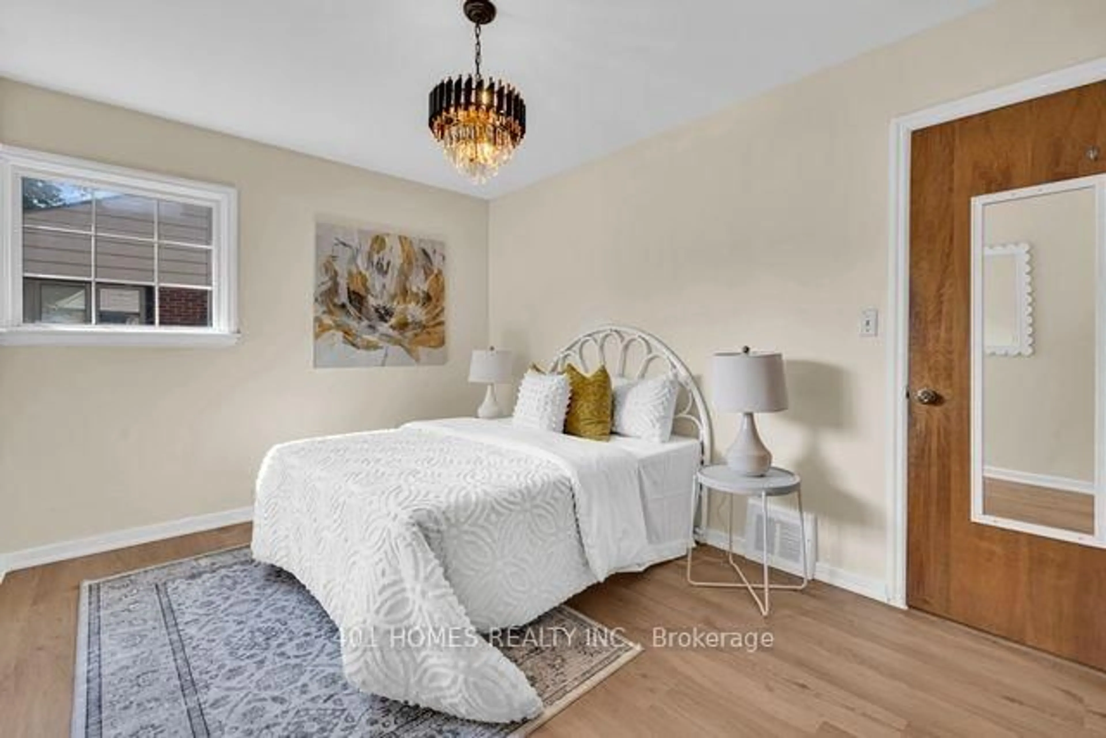 Bedroom with bed, wood/laminate floor for 3711 Dandurand Blvd, Windsor Ontario N9E 2G4