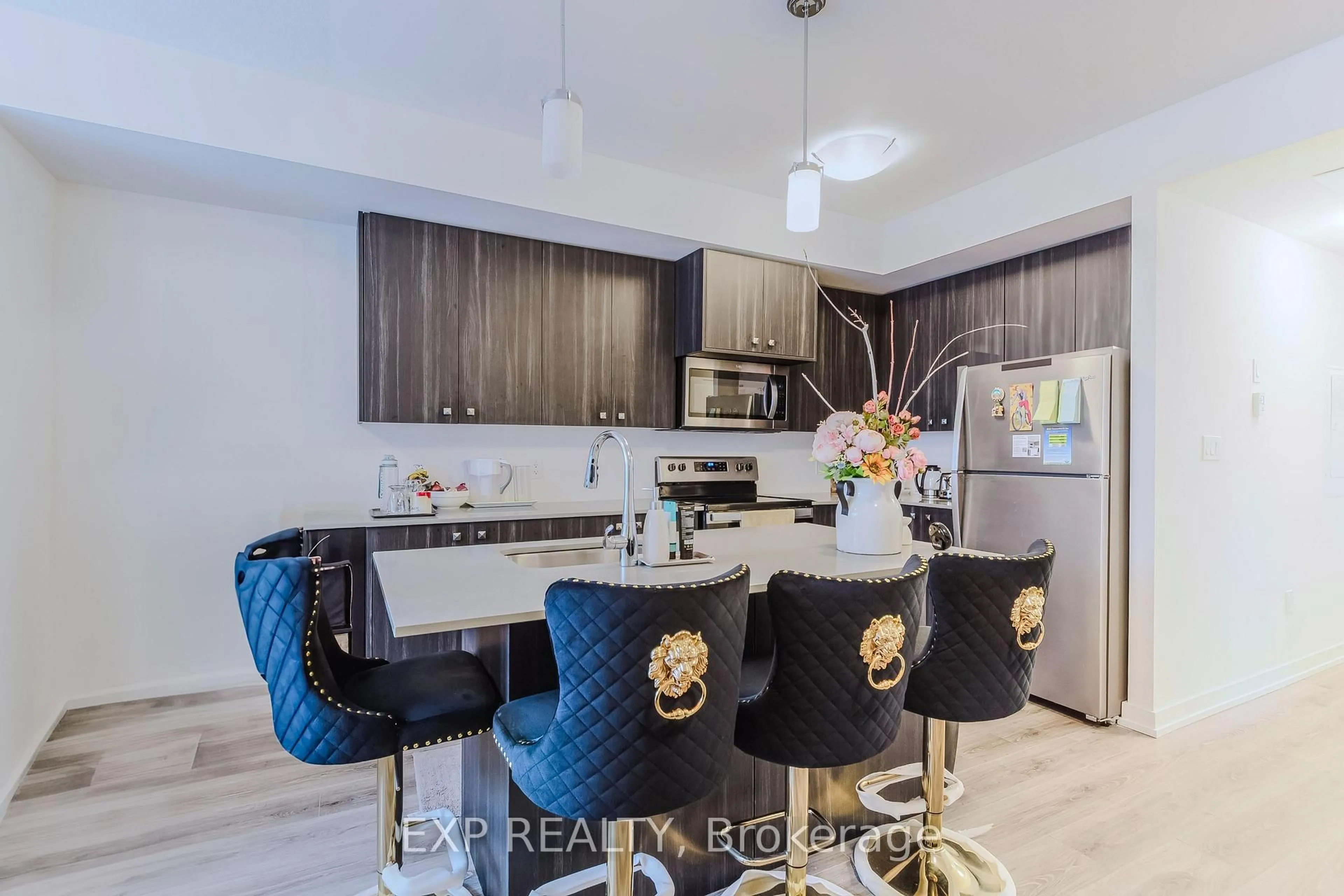 Open concept kitchen, wood/laminate floor for 20 Palace St #E1, Kitchener Ontario N2E 0J3