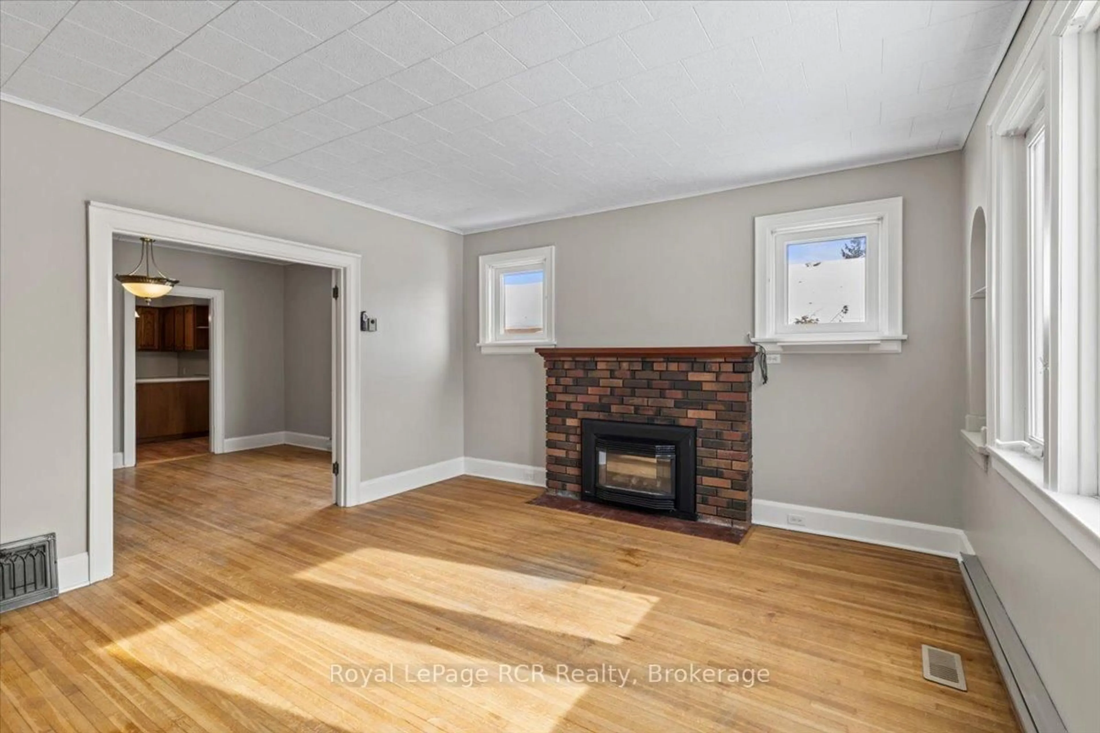 Living room with furniture, wood/laminate floor for 4 Cayley St, Brockton Ontario N0G 2V0