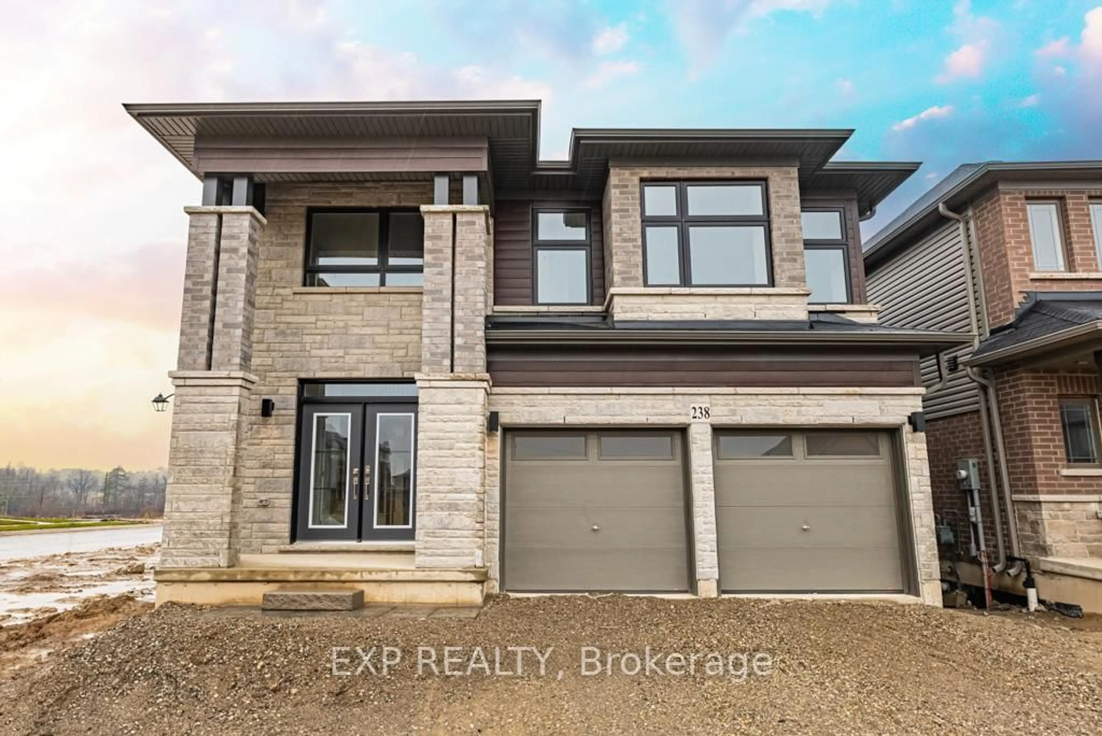 Home with brick exterior material, street for 238 Long Boat Ru, Brantford Ontario N3T 0X1