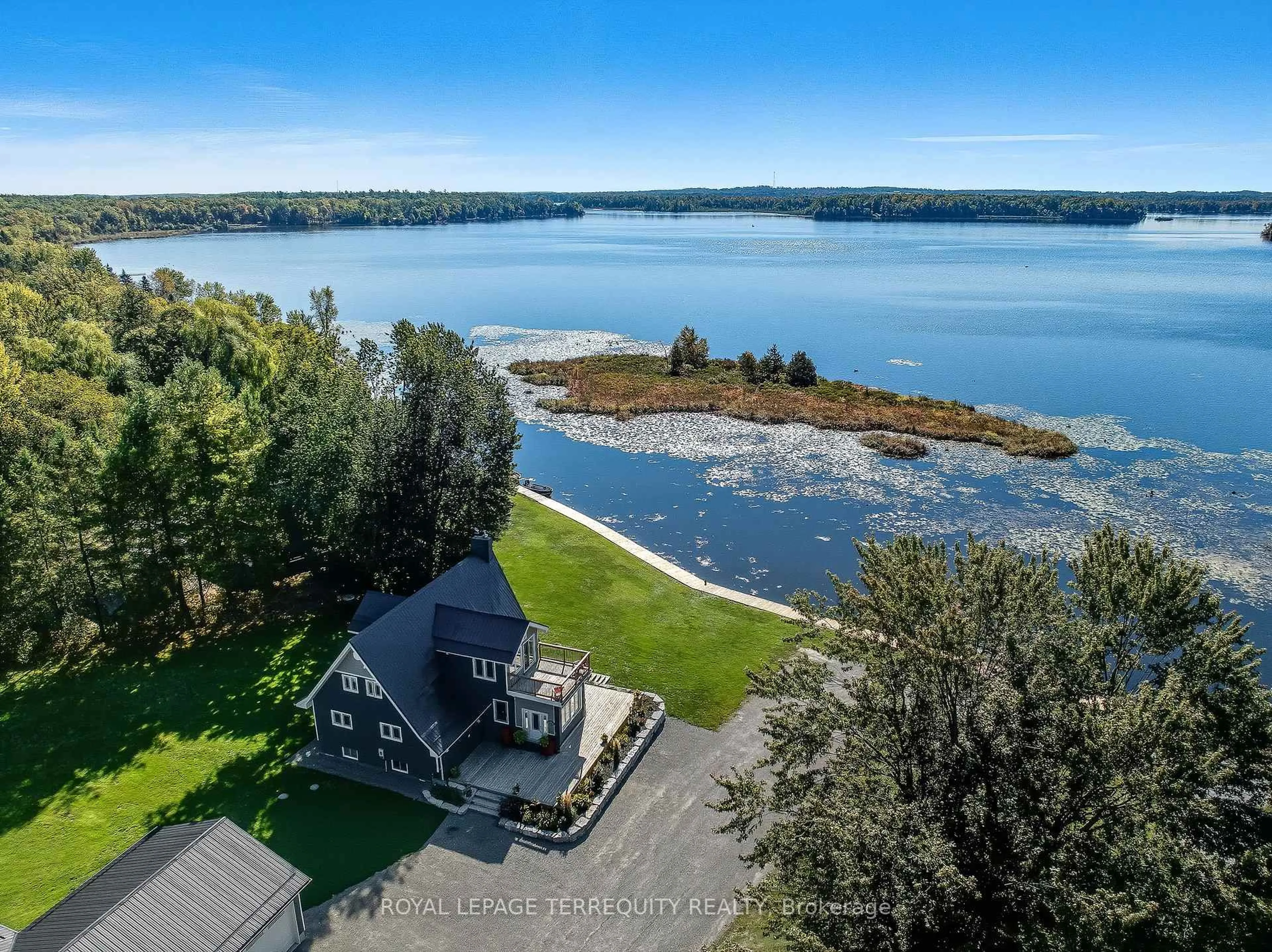 A pic from outside/outdoor area/front of a property/back of a property/a pic from drone, water/lake/river/ocean view for 1573 Trent River Rd, Trent Hills Ontario K0L 1Z0