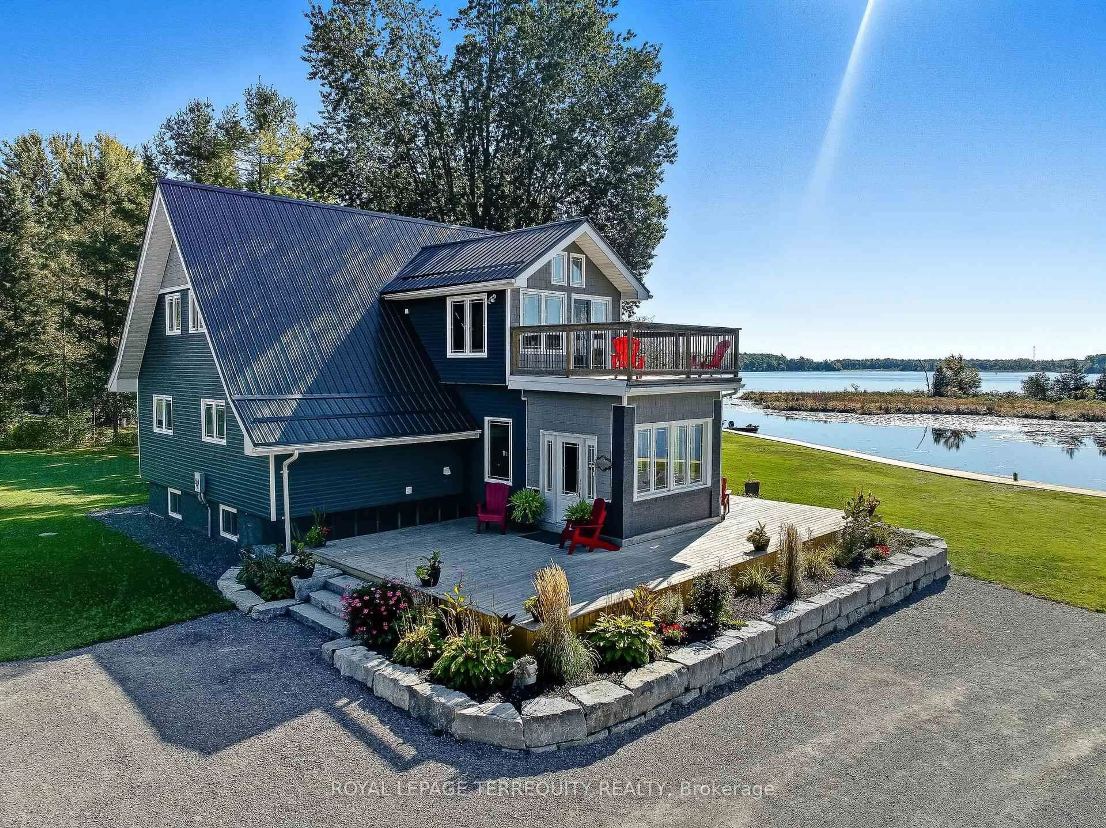 A pic from outside/outdoor area/front of a property/back of a property/a pic from drone, water/lake/river/ocean view for 1573 Trent River Rd, Trent Hills Ontario K0L 1Z0