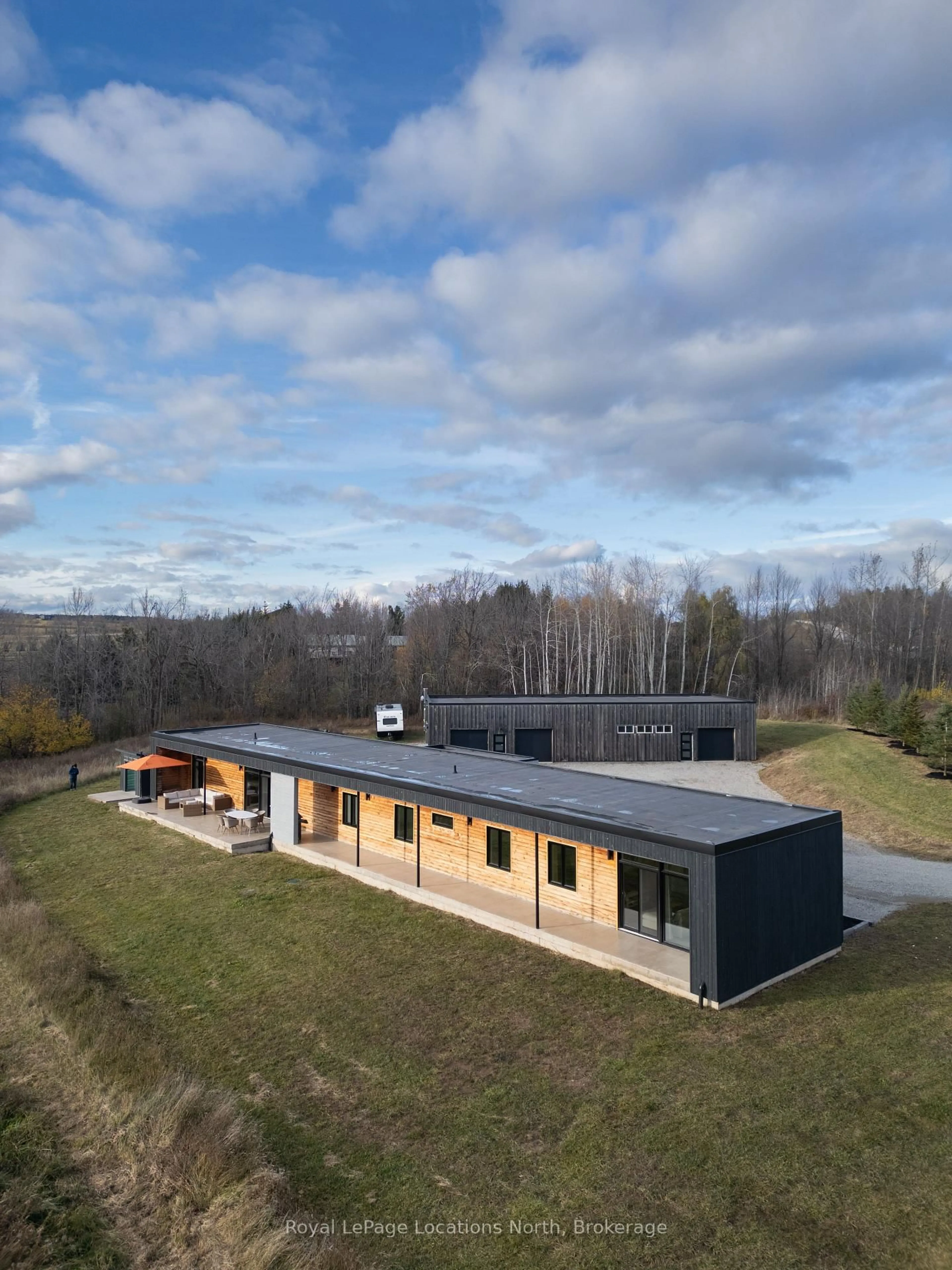 A pic from outside/outdoor area/front of a property/back of a property/a pic from drone, building for 317160 3rd Line, Meaford Ontario N4L 1W7