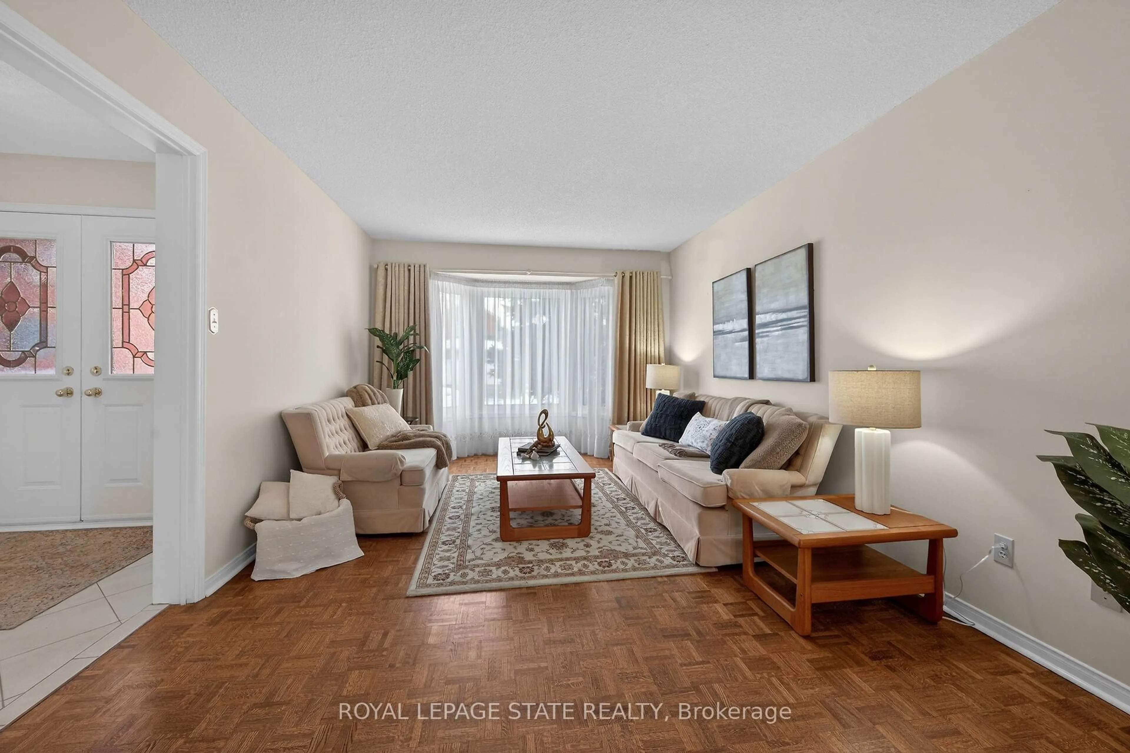 Living room with furniture, unknown for 134 Huntingwood Ave, Hamilton Ontario L9H 6X7