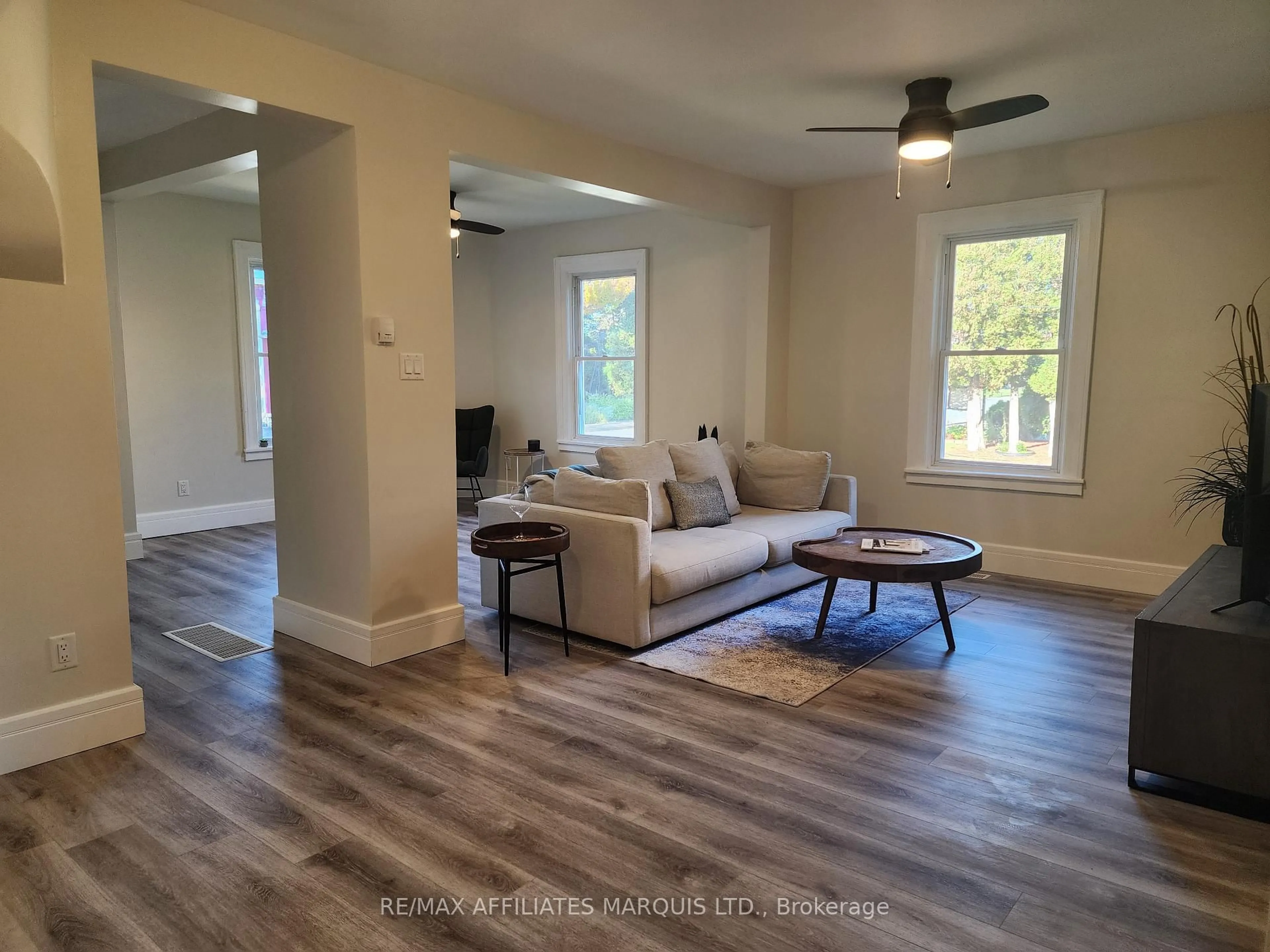 Living room with furniture, wood/laminate floor for 12 Oak St, South Glengarry Ontario K0C 1N0