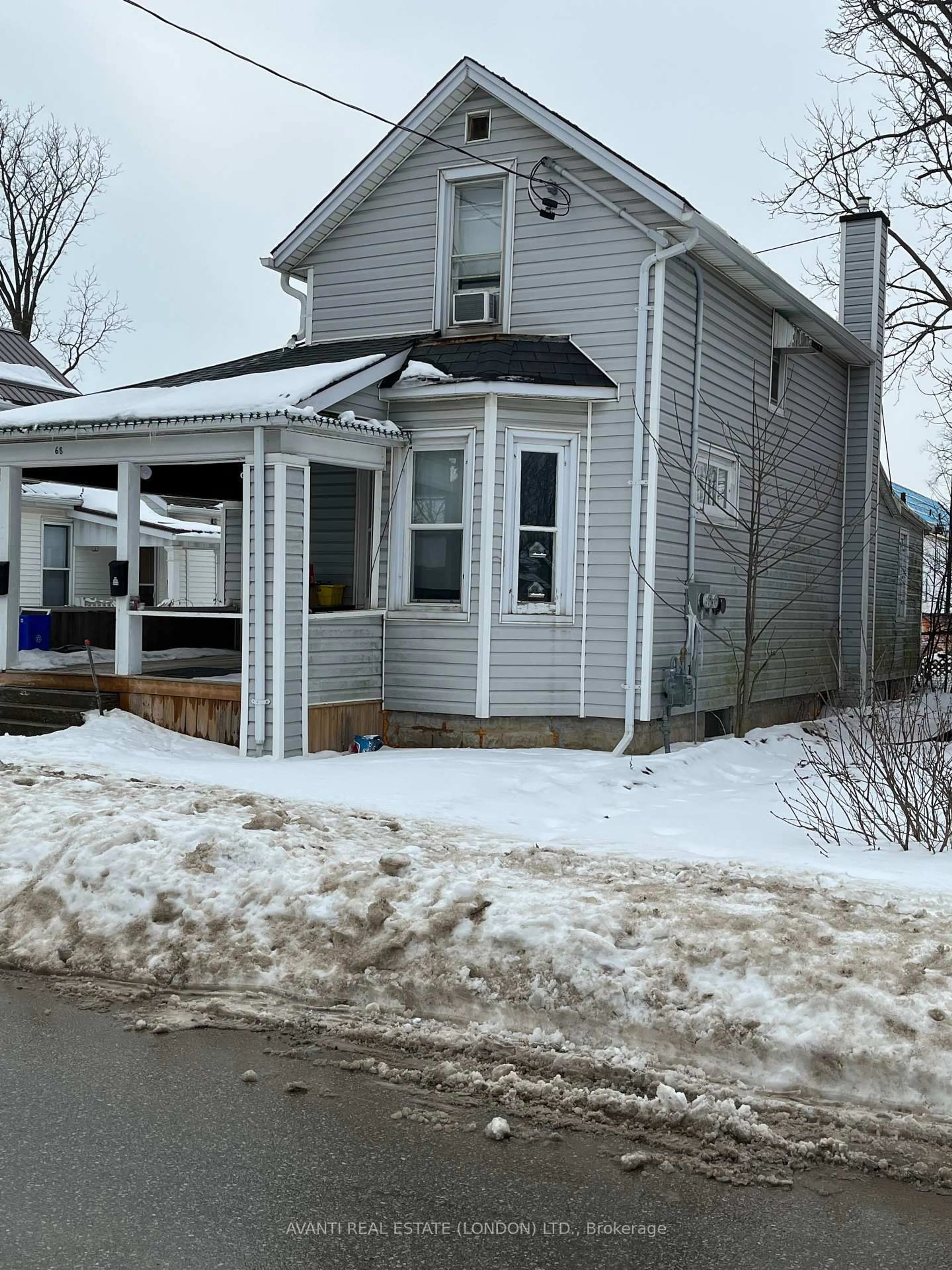 Home with vinyl exterior material, street for 68 Flora St, St. Thomas Ontario N5P 2X6