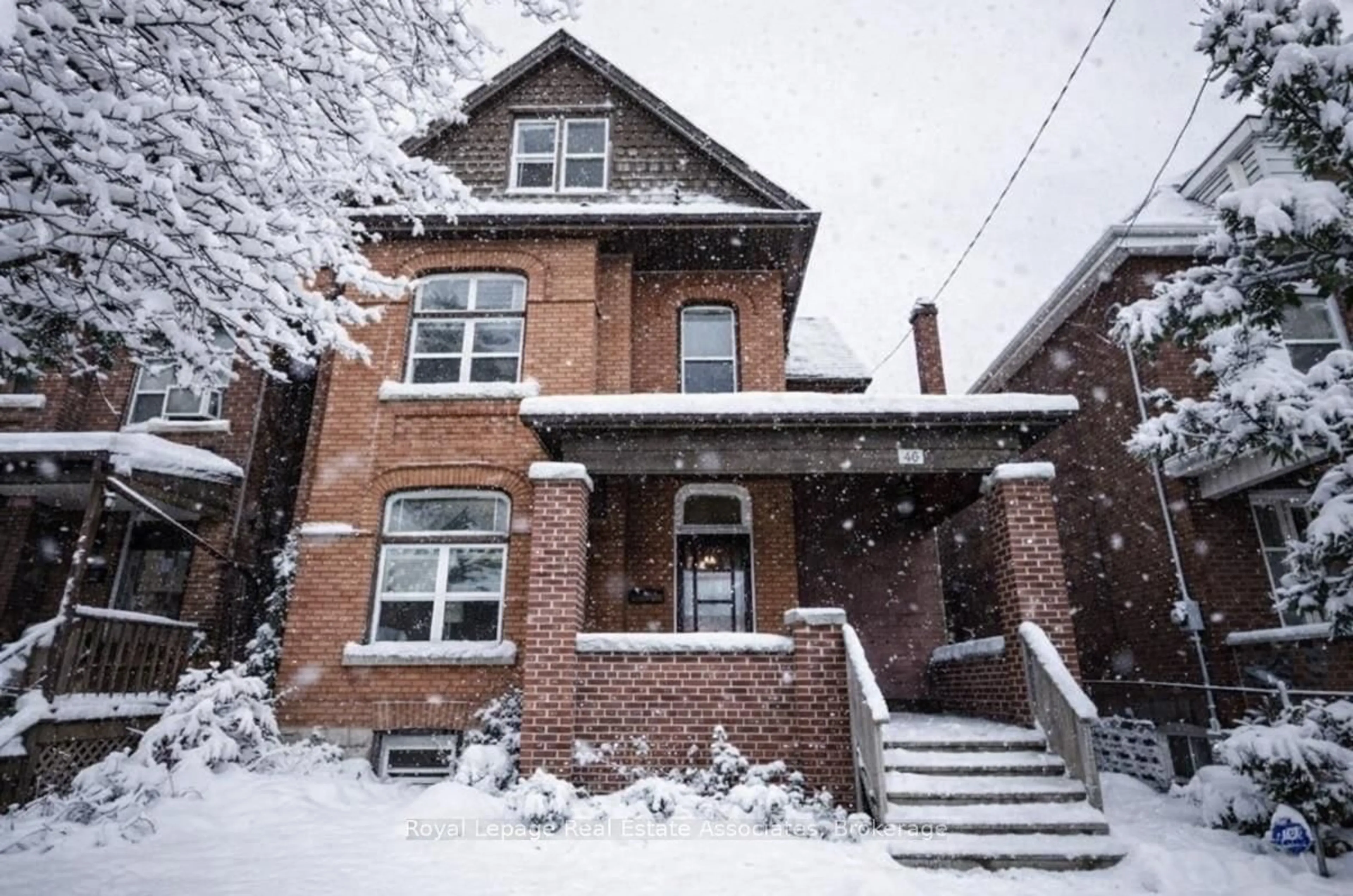 Home with brick exterior material, street for 86 Sherman Ave, Hamilton Ontario L8L 6M4