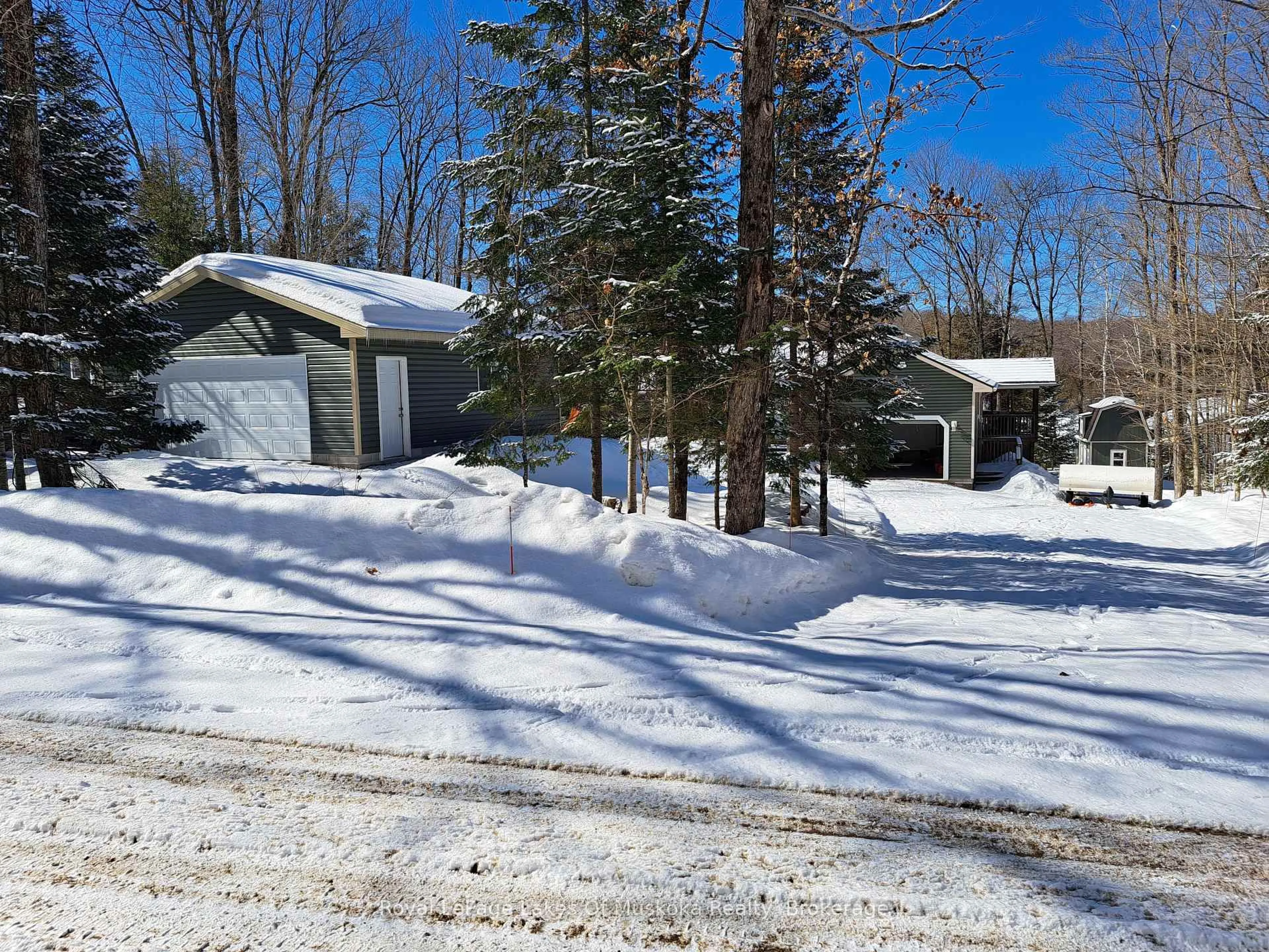 A pic from outside/outdoor area/front of a property/back of a property/a pic from drone, street for 340 Wurm Rd, Magnetawan Ontario P0A 1P0