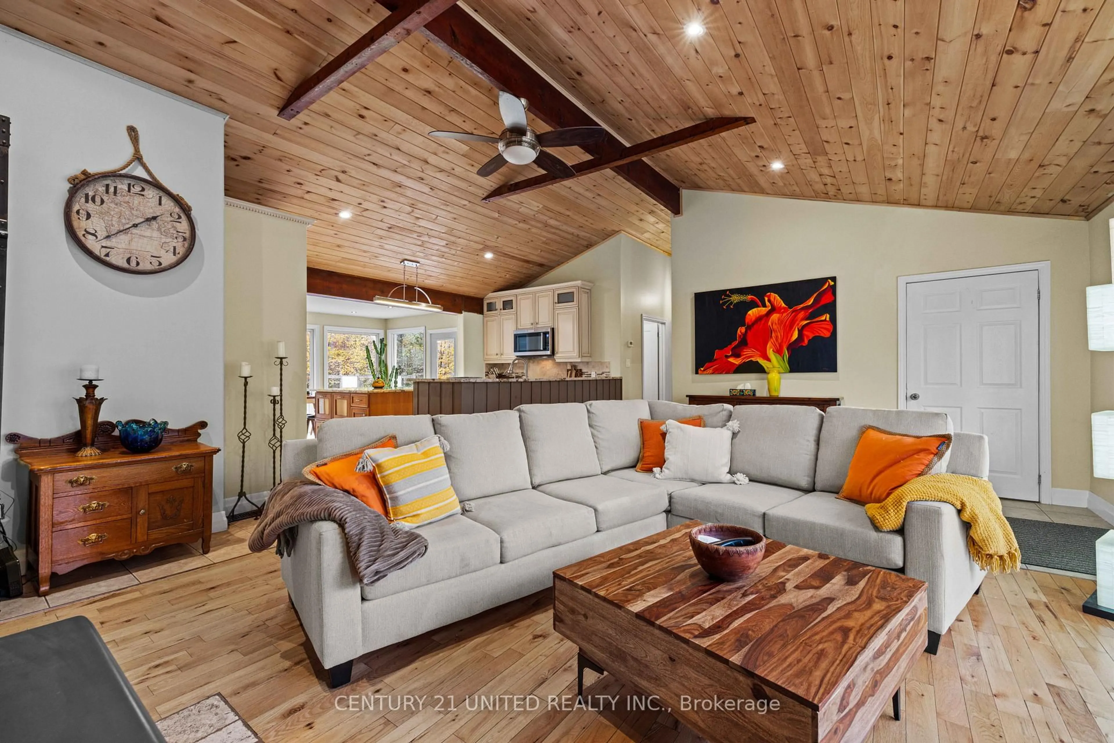 Living room with furniture, wood/laminate floor for 25 Sugarbush Blvd, Trent Lakes Ontario K0L 1J0