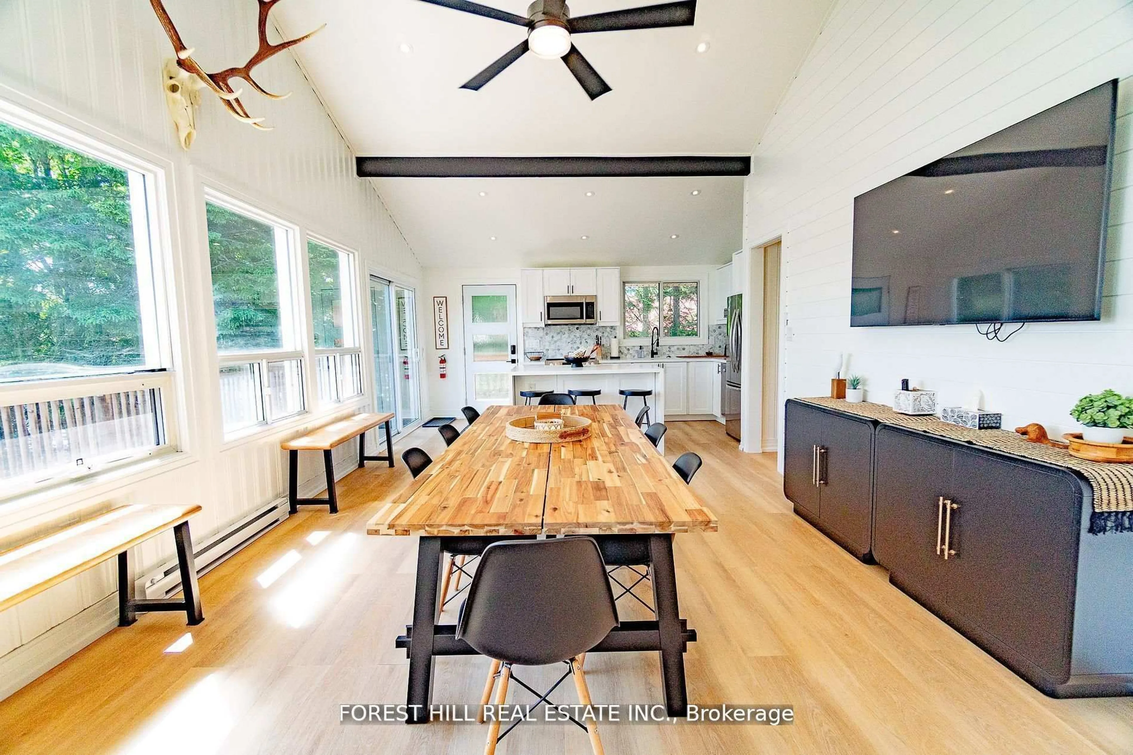 Open concept kitchen, wood/laminate floor for 135 Buckvale Dr, McMurrich/Monteith Ontario P0A 1Y0